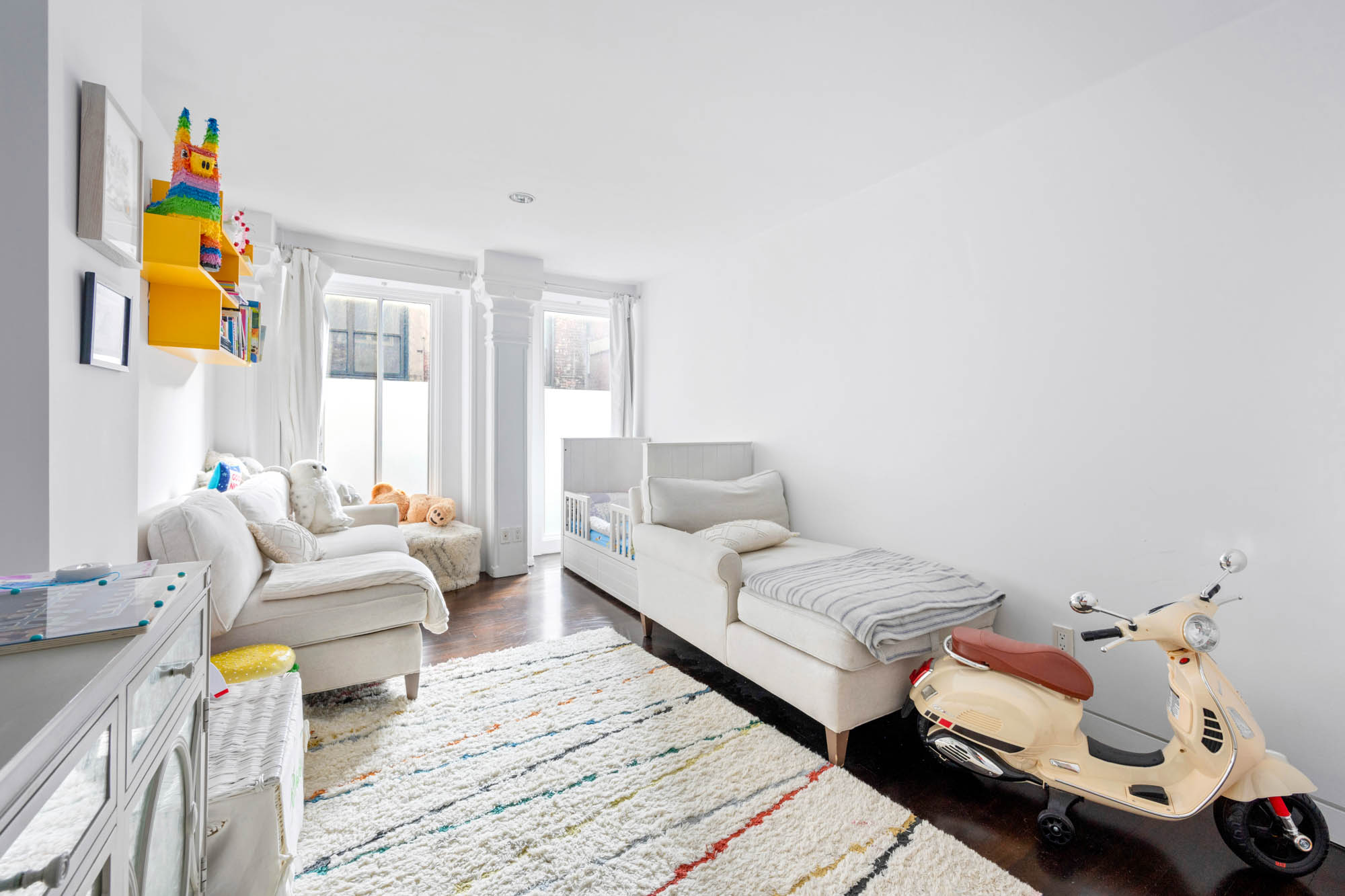 8 Thomas Street, Unit 2 Manhattan, NY 10007 - Photo 6 of 9 a living room with furniture and a couch