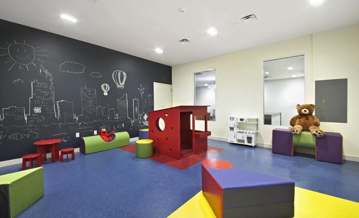 23 West 116th Street, Unit 8A Manhattan, NY 10026 - Photo 24 of 28 a living room with furniture and wooden floor