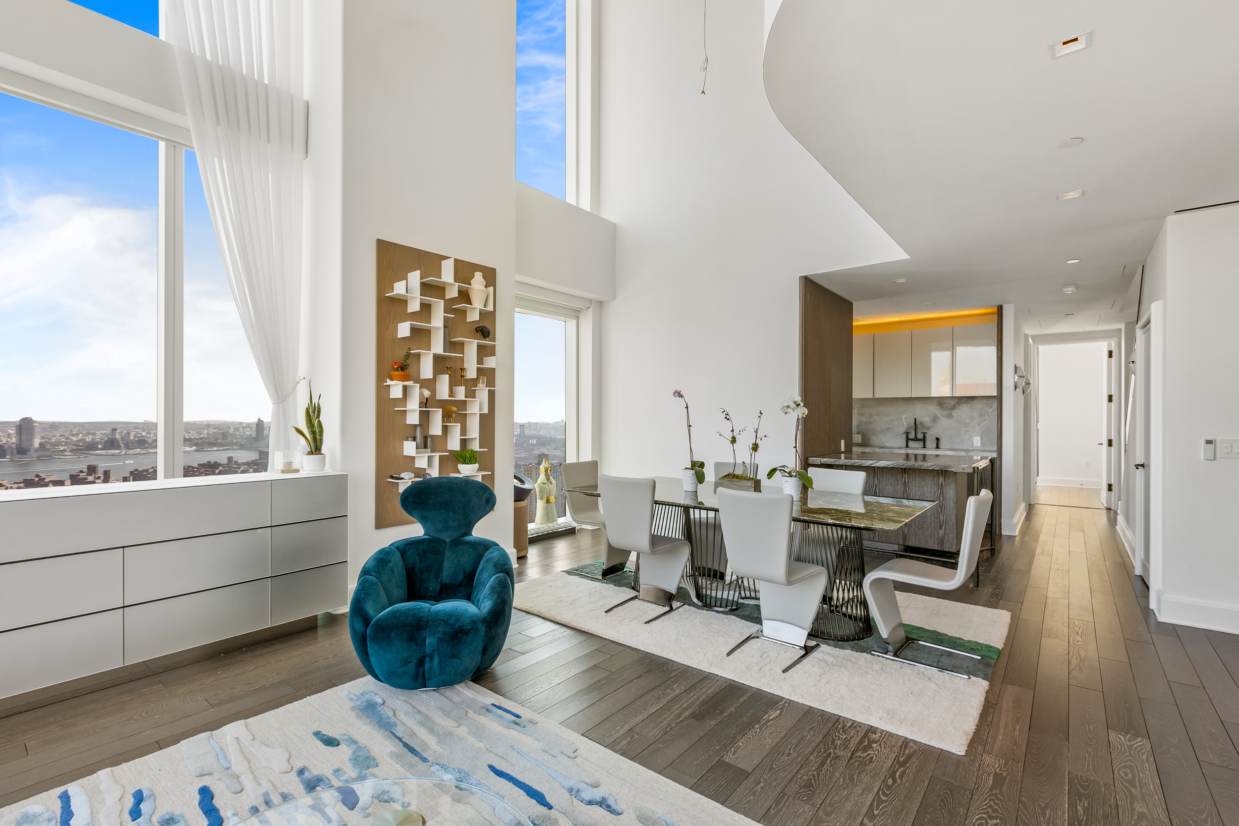 45 East 22nd Street, Unit 42B Manhattan, NY 10010 - Photo 2 of 23 a living room with furniture and a large window