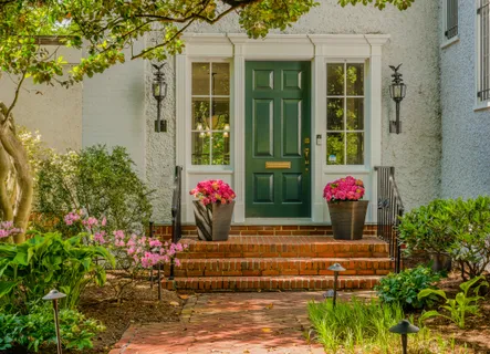 a front view of a house with a porch
