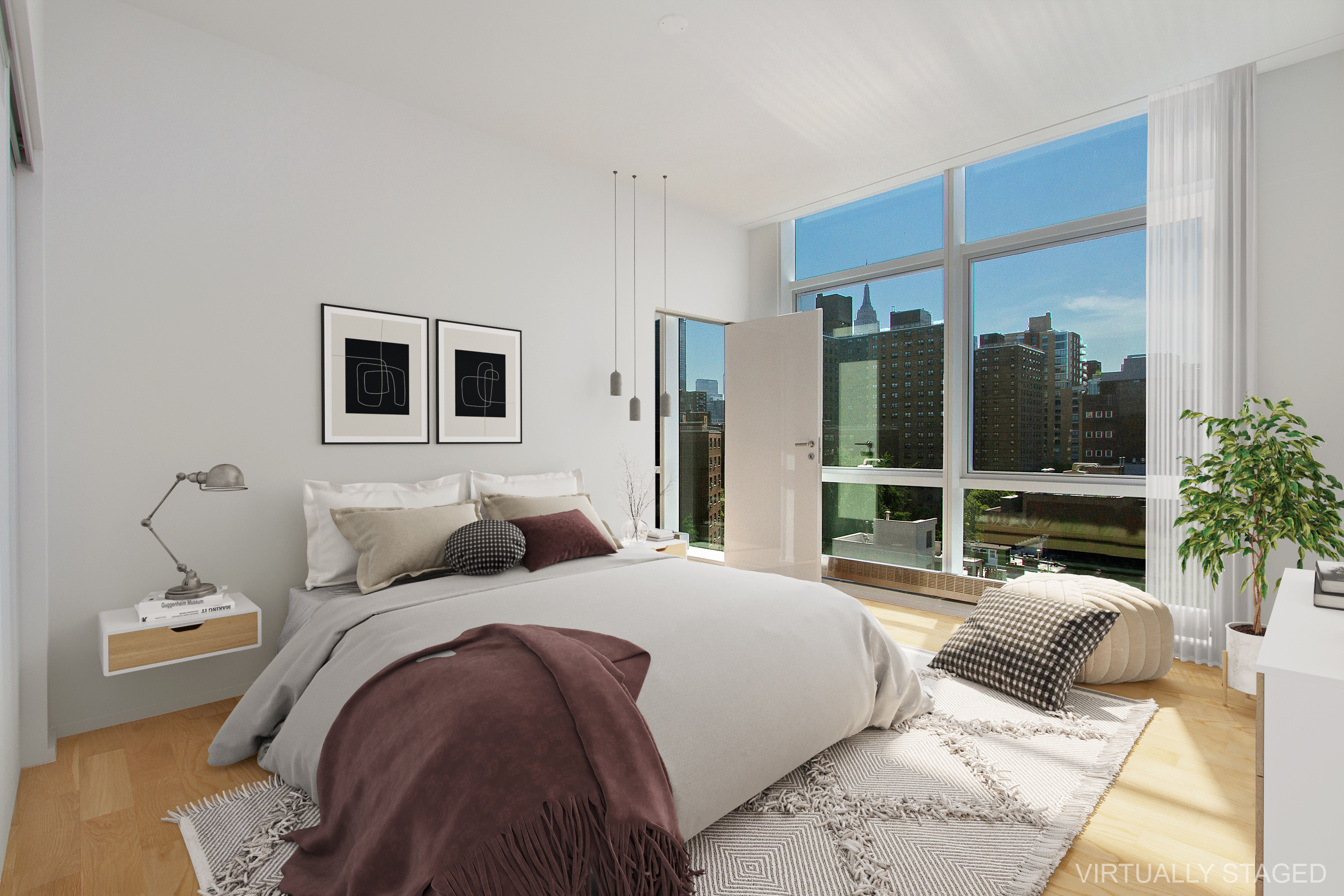 245 10th Avenue, Unit 8E Manhattan, NY 10001 - Photo 11 of 15 a bedroom with a large bed and a flat screen tv