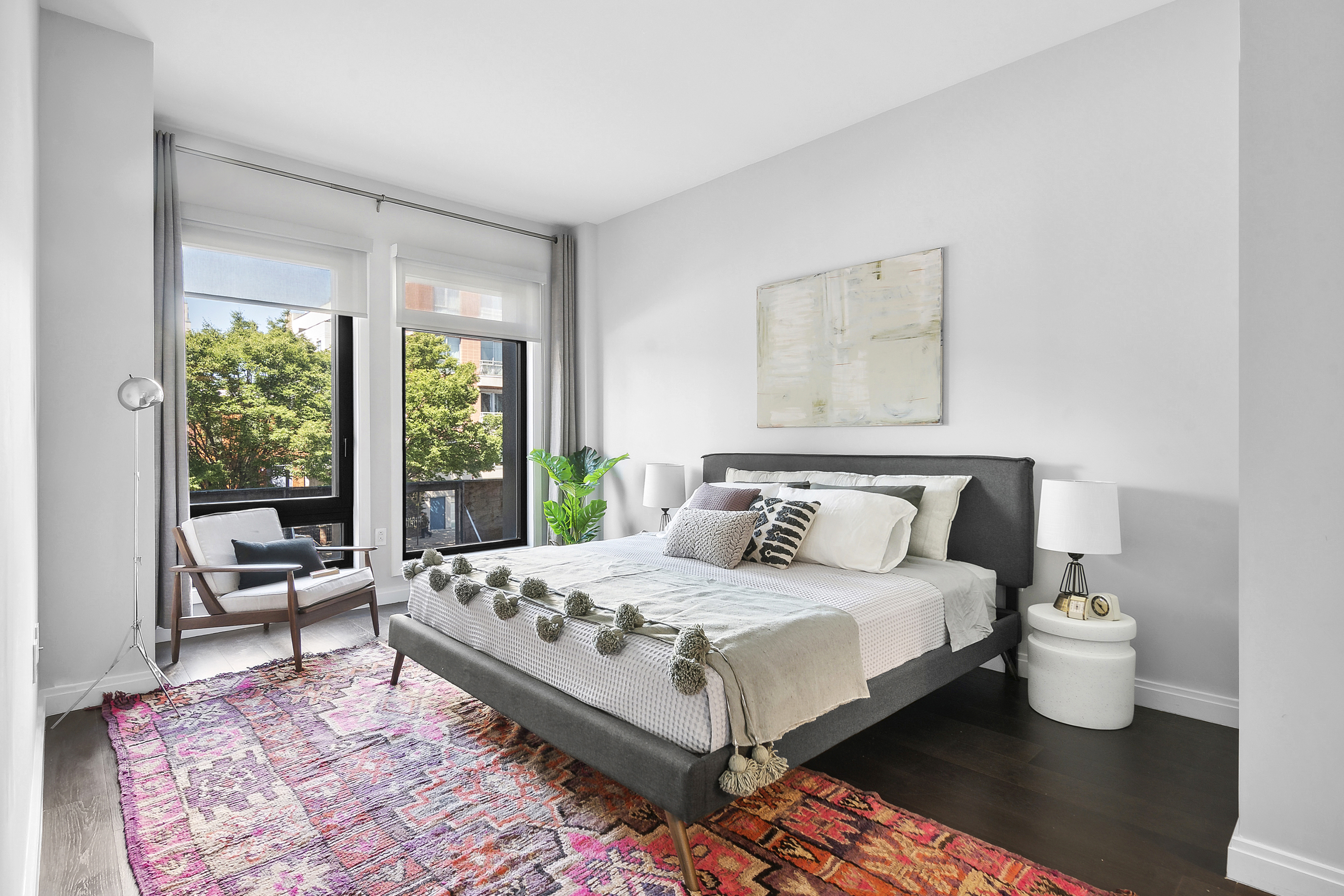 613 Baltic Street, Unit 2C Brooklyn, NY 11217 - Photo 5 of 16 a large bedroom with a bed and wooden floor