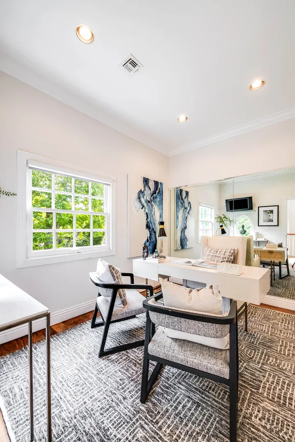 a living room with furniture and a window
