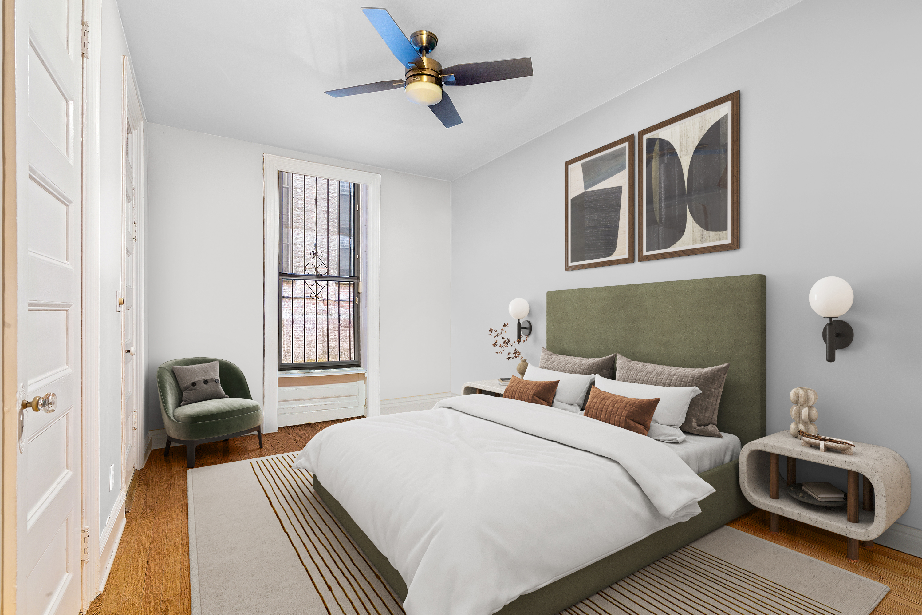 311 West 97th Street, Unit 1W Manhattan, NY 10025 - Photo 5 of 15 a bedroom with a bed wooden floor and window
