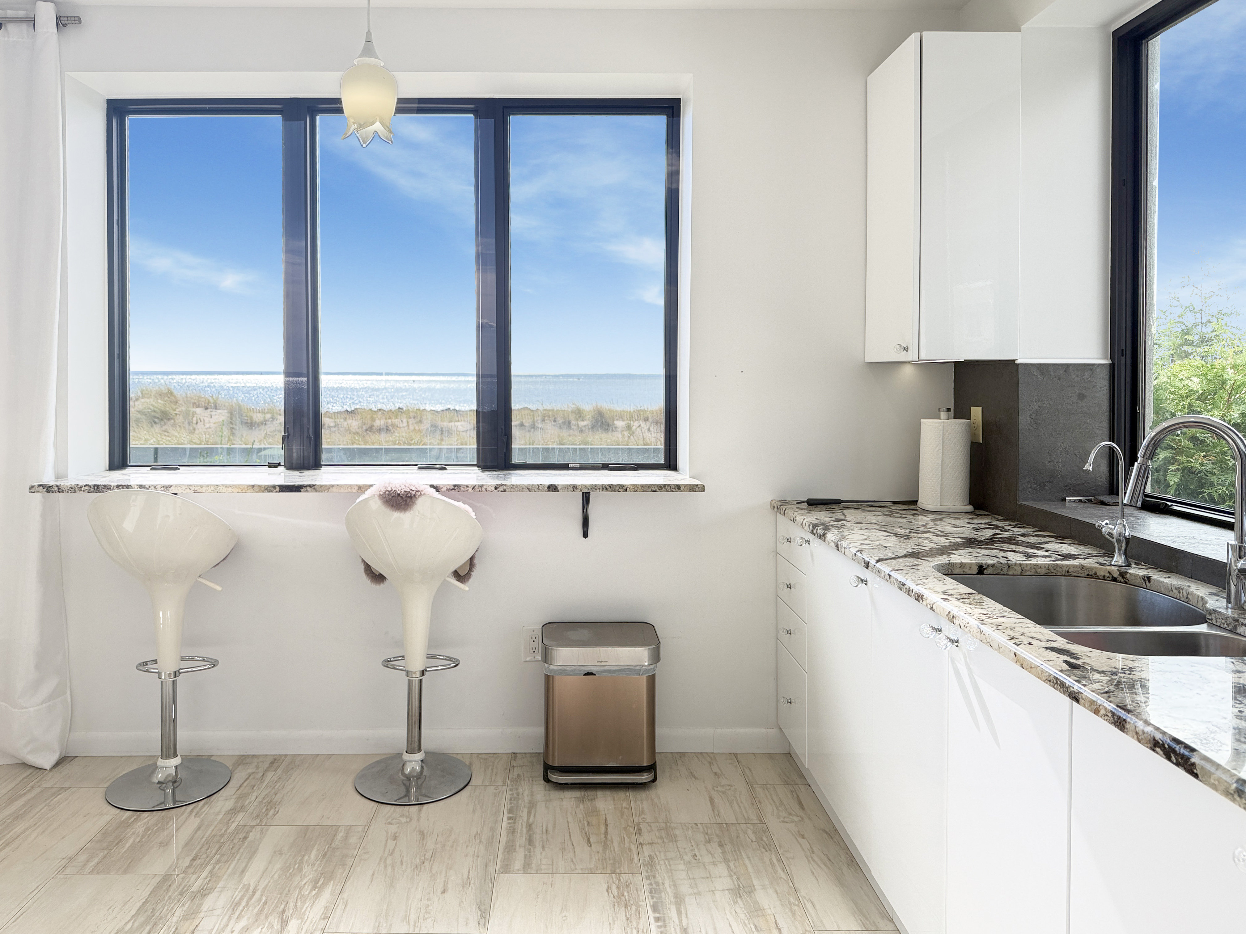 3848 Atlantic Avenue Brooklyn, NY 11224 - Photo 9 of 29 a kitchen with a sink and a window