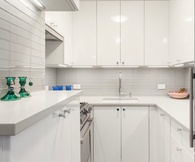 61 Jane Street, Unit 15A Manhattan, NY 10014 - Photo 4 of 10 a kitchen with appliances cabinets and a sink