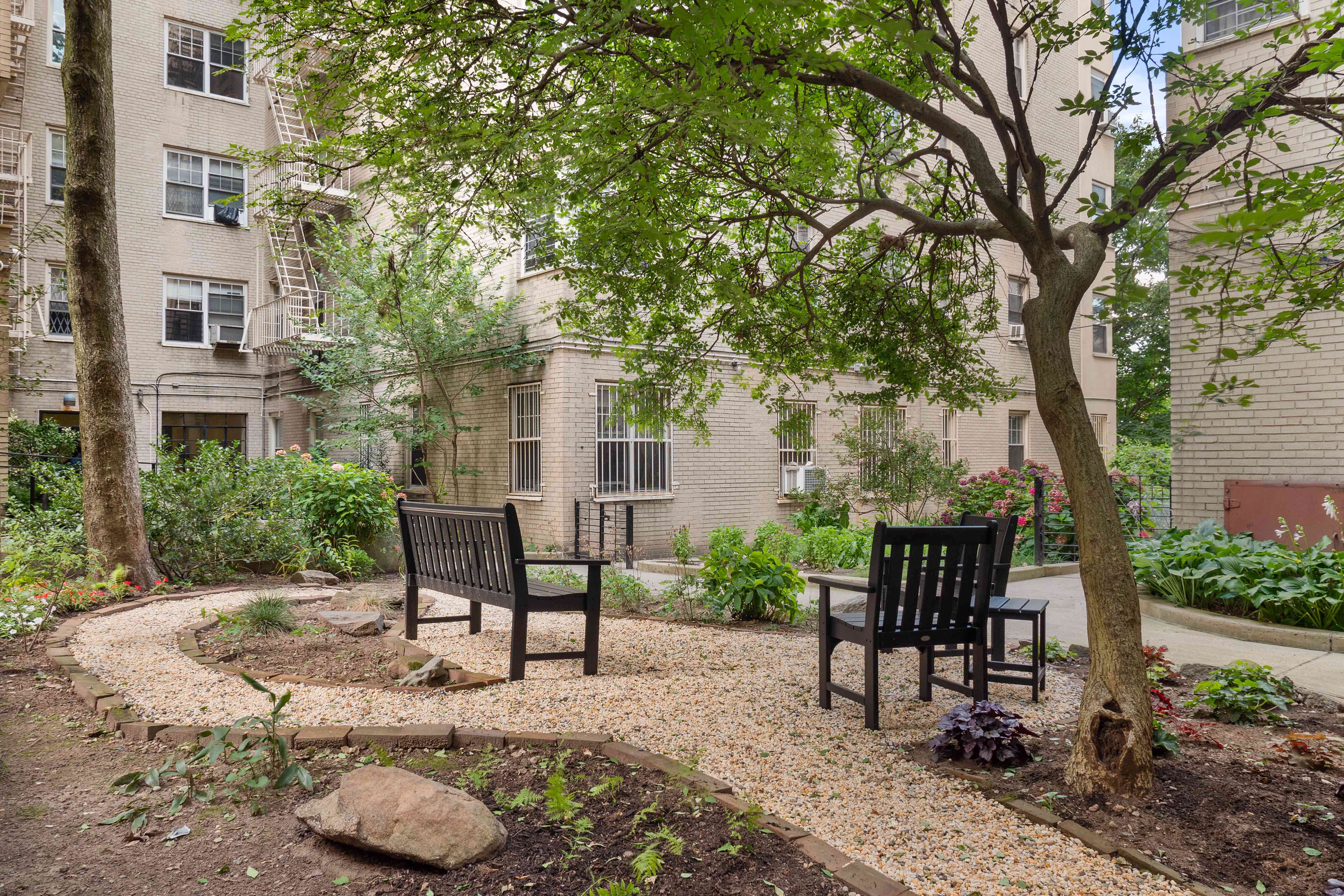 720 Fort Washington Avenue, Unit 5D Manhattan, NY 10040 - Photo 10 of 17 a view of a chairs and table in backyard