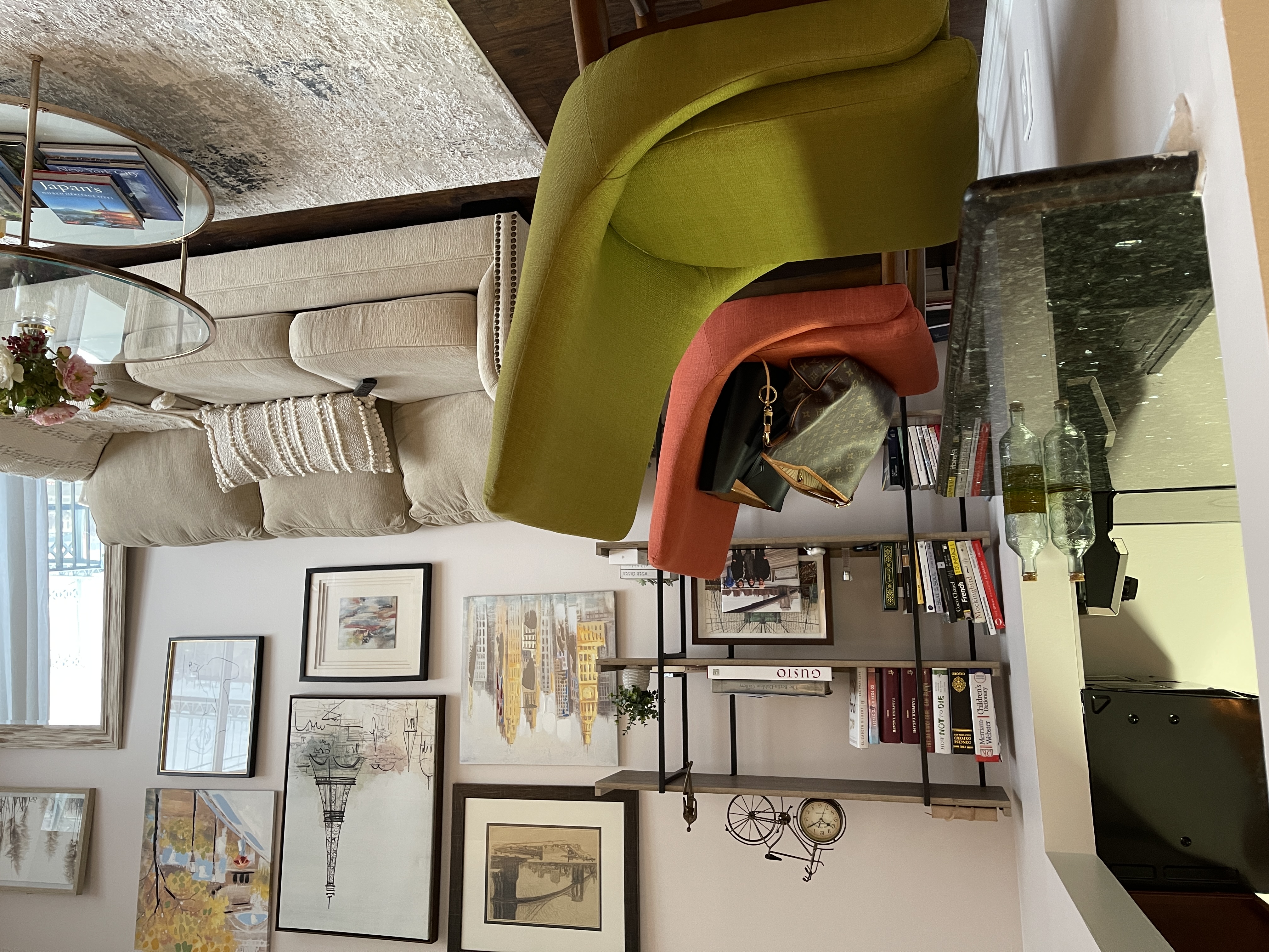 25-40 Shore Boulevard, Unit 8T Queens, NY 11102 - Photo 8 of 23 a living room with furniture and a flat screen tv