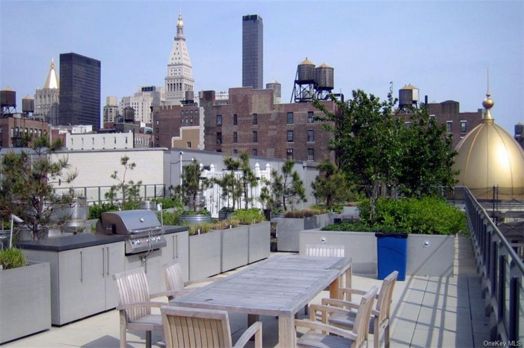 655 6th Avenue, Unit 4A Manhattan, NY 10010 - Photo 4 of 6 a view of a terrace with sitting area