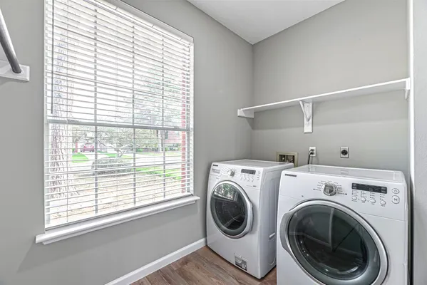a utility room with dryer and washer