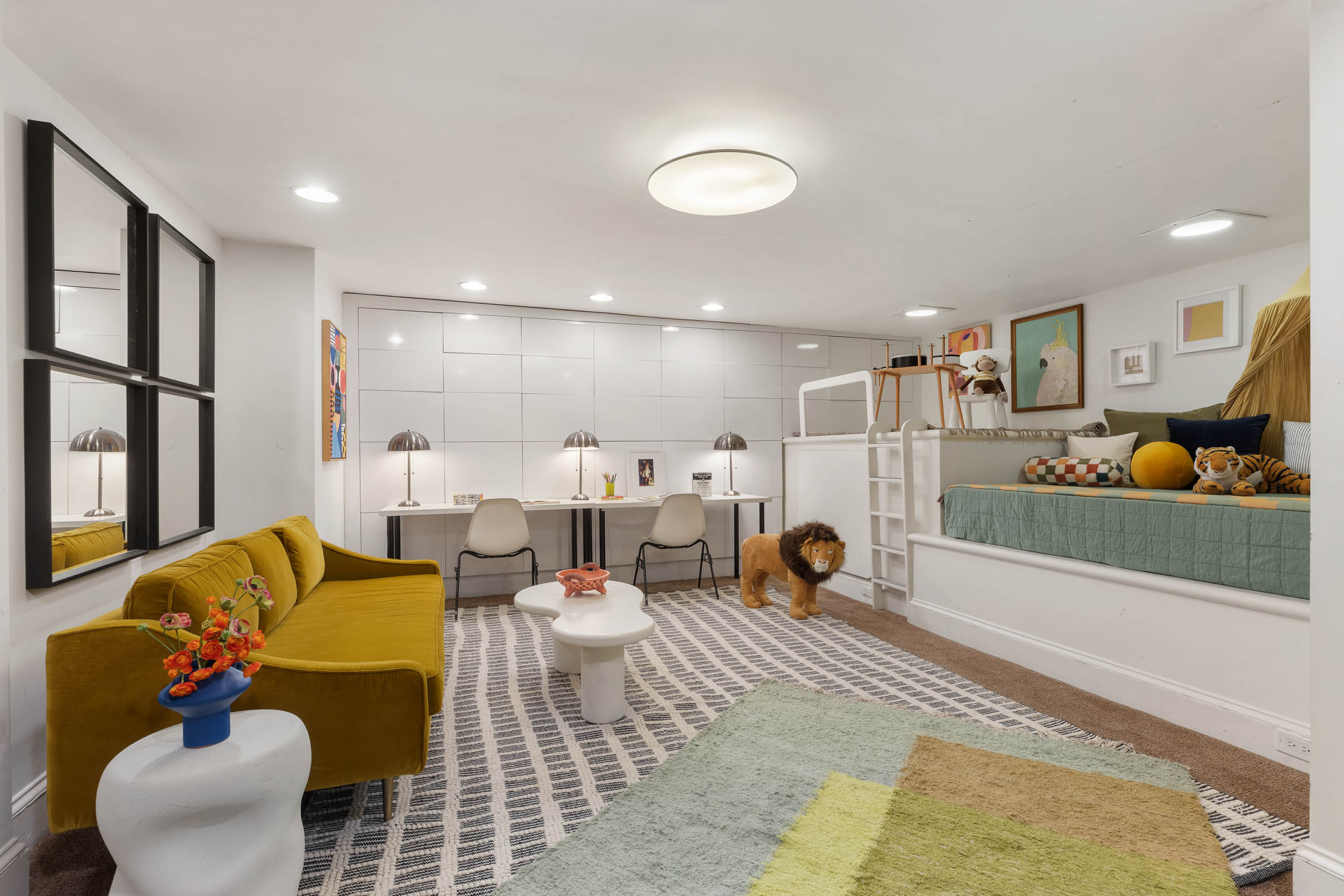 313 West 20th Street Manhattan, NY 10011 - Photo 9 of 20 a living room with furniture and a flat screen tv