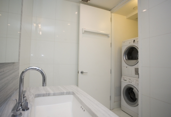 117 West 123rd Street, Unit 4B Manhattan, NY 10027 - Photo 11 of 16 a close view of a sink and a shower in a bathroom