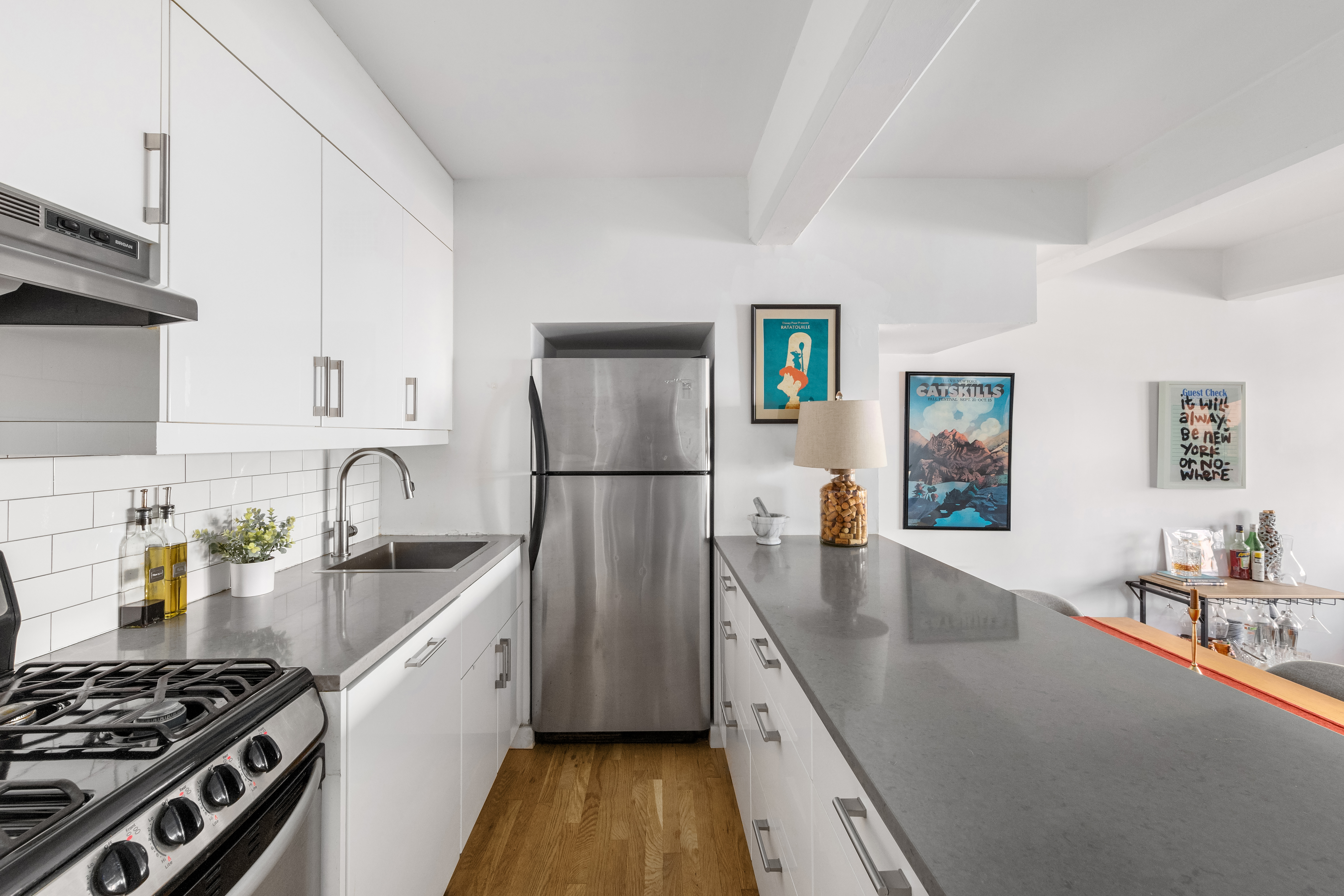 110 Clifton Place, Unit 2A Brooklyn, NY 11238 - Photo 3 of 8 a kitchen with sink a stove and refrigerator