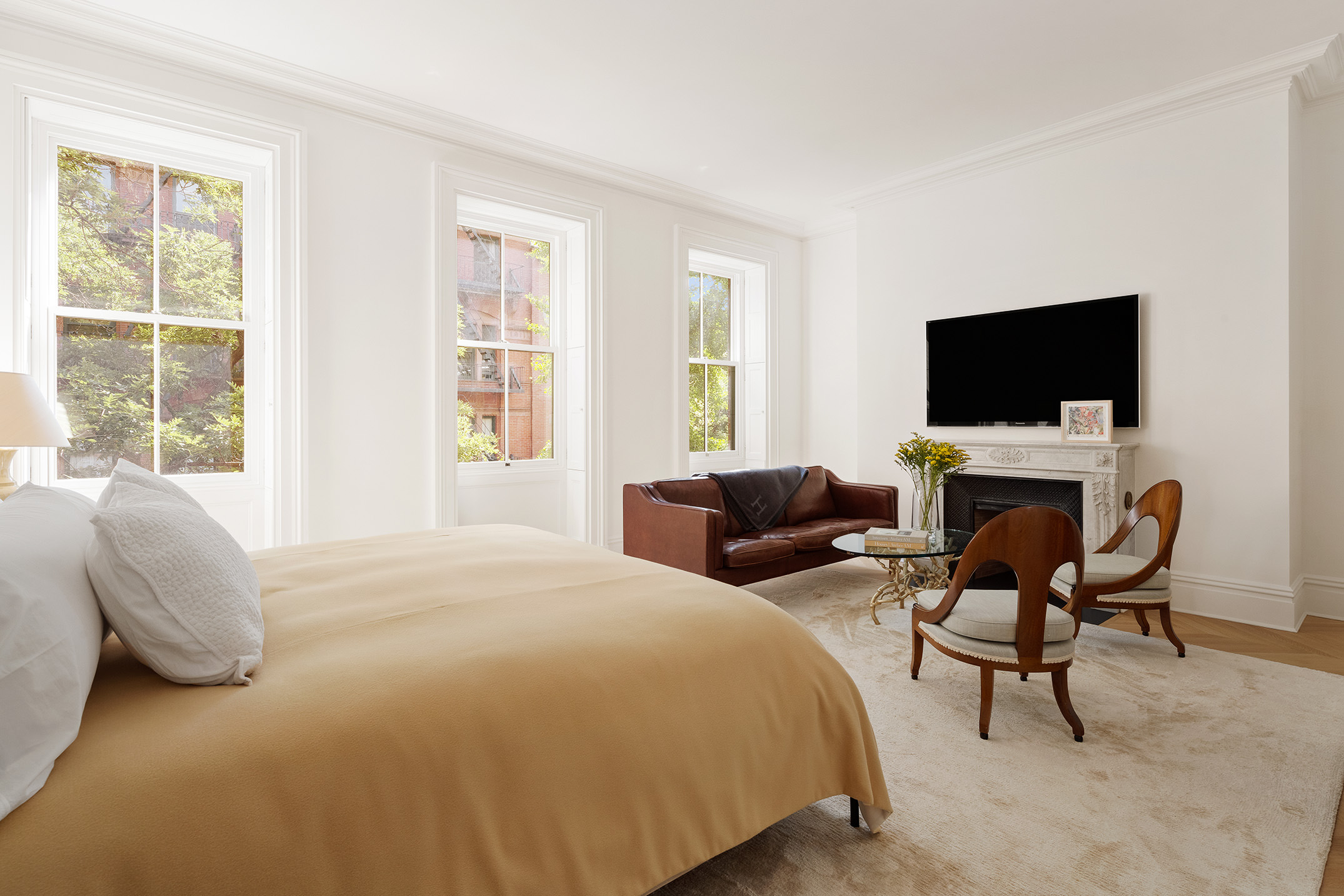 55 West 9th Street Manhattan, NY 10011 - Photo 15 of 20 a bedroom with a bed and a window