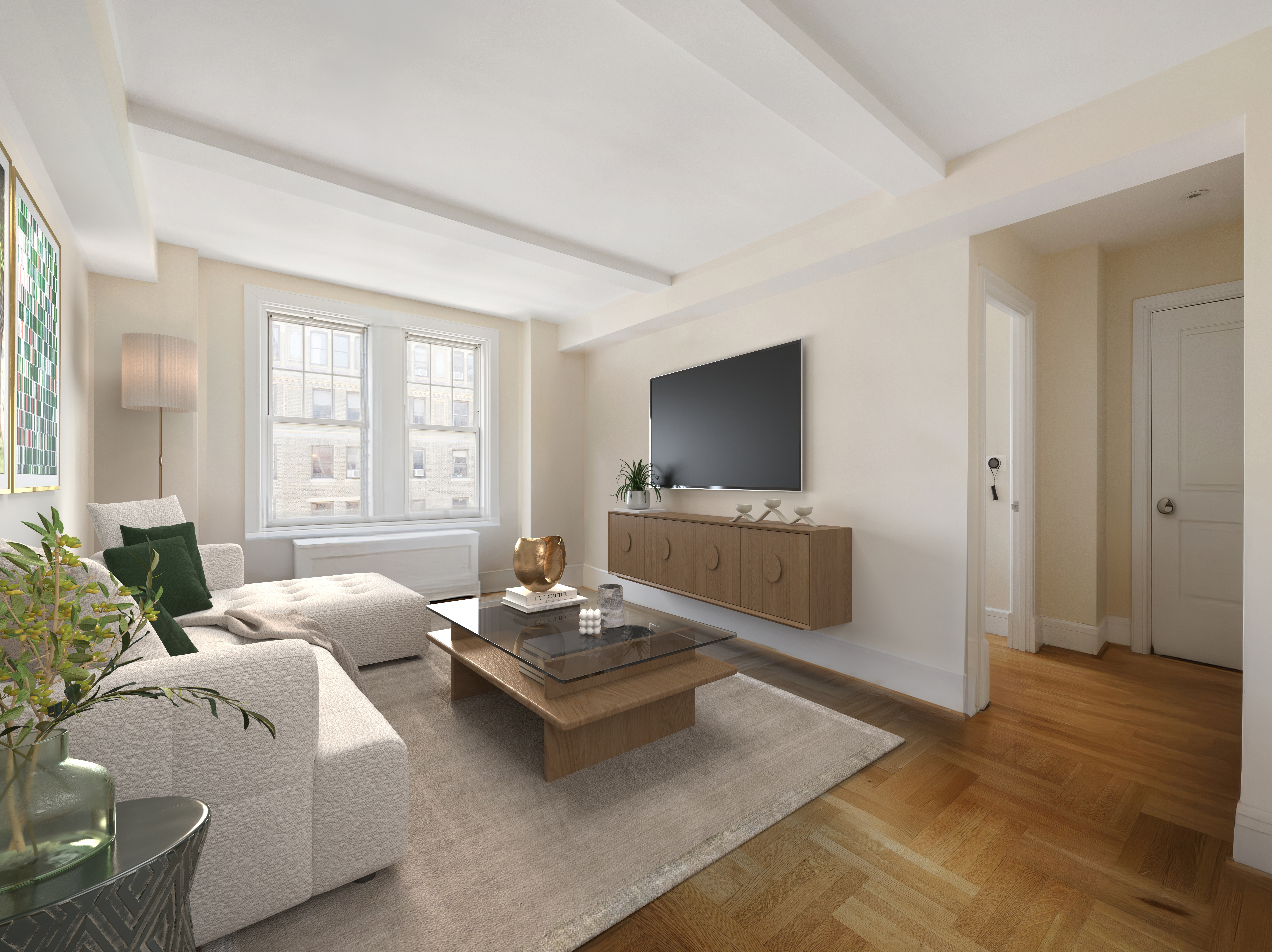 27 West 72nd Street, Unit 1403 Manhattan, NY 10023 - Photo 3 of 18 a living room with furniture and a flat screen tv