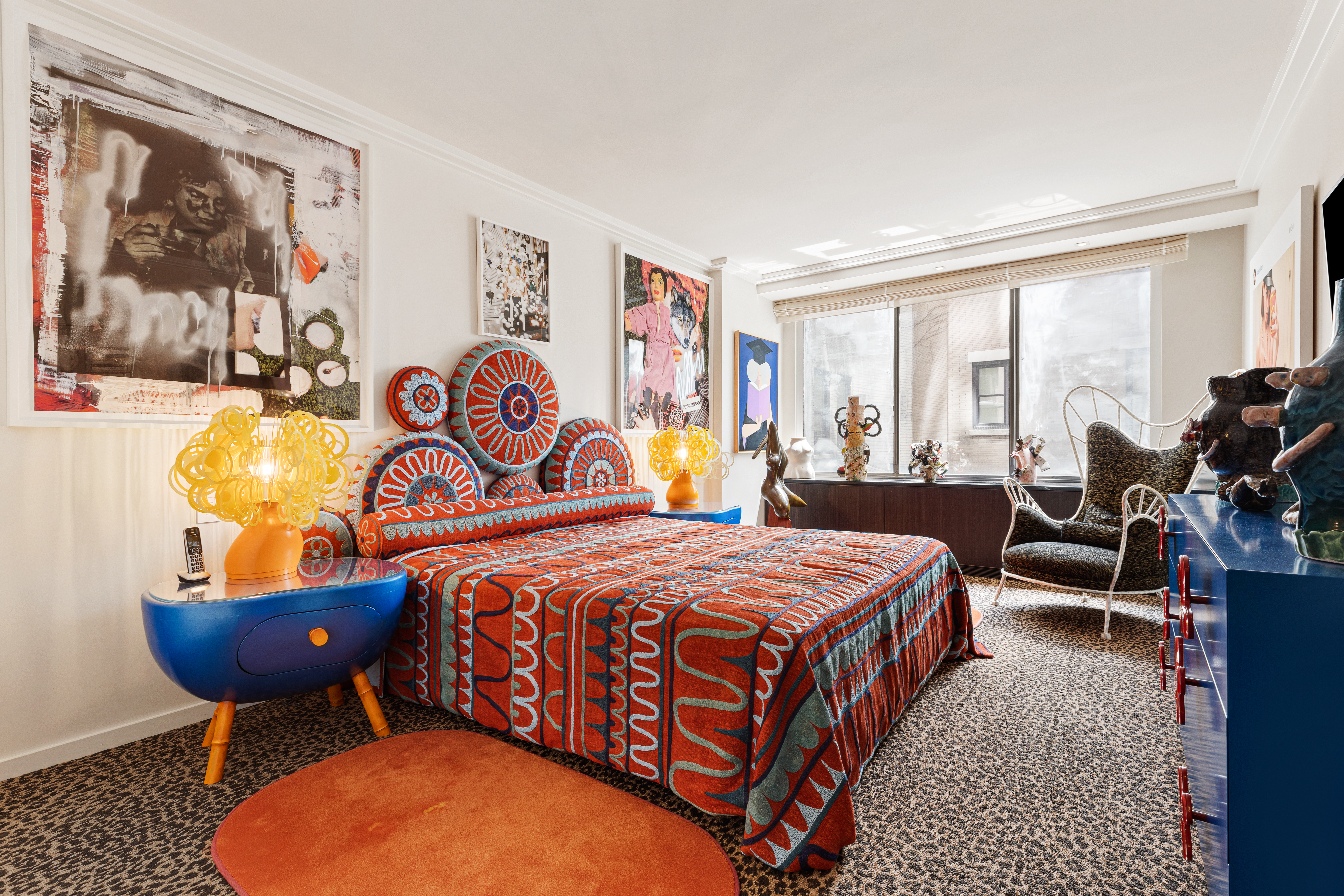 1001 5th Avenue, Unit 4C Manhattan, NY 10028 - Photo 7 of 11 a bedroom with a bed a table and chair