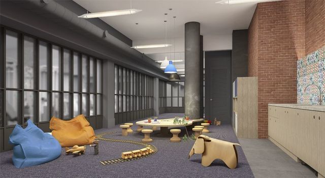 51 Jay Street, Unit 3I Brooklyn, NY 11201 - Photo 11 of 14 a living room with furniture and a table