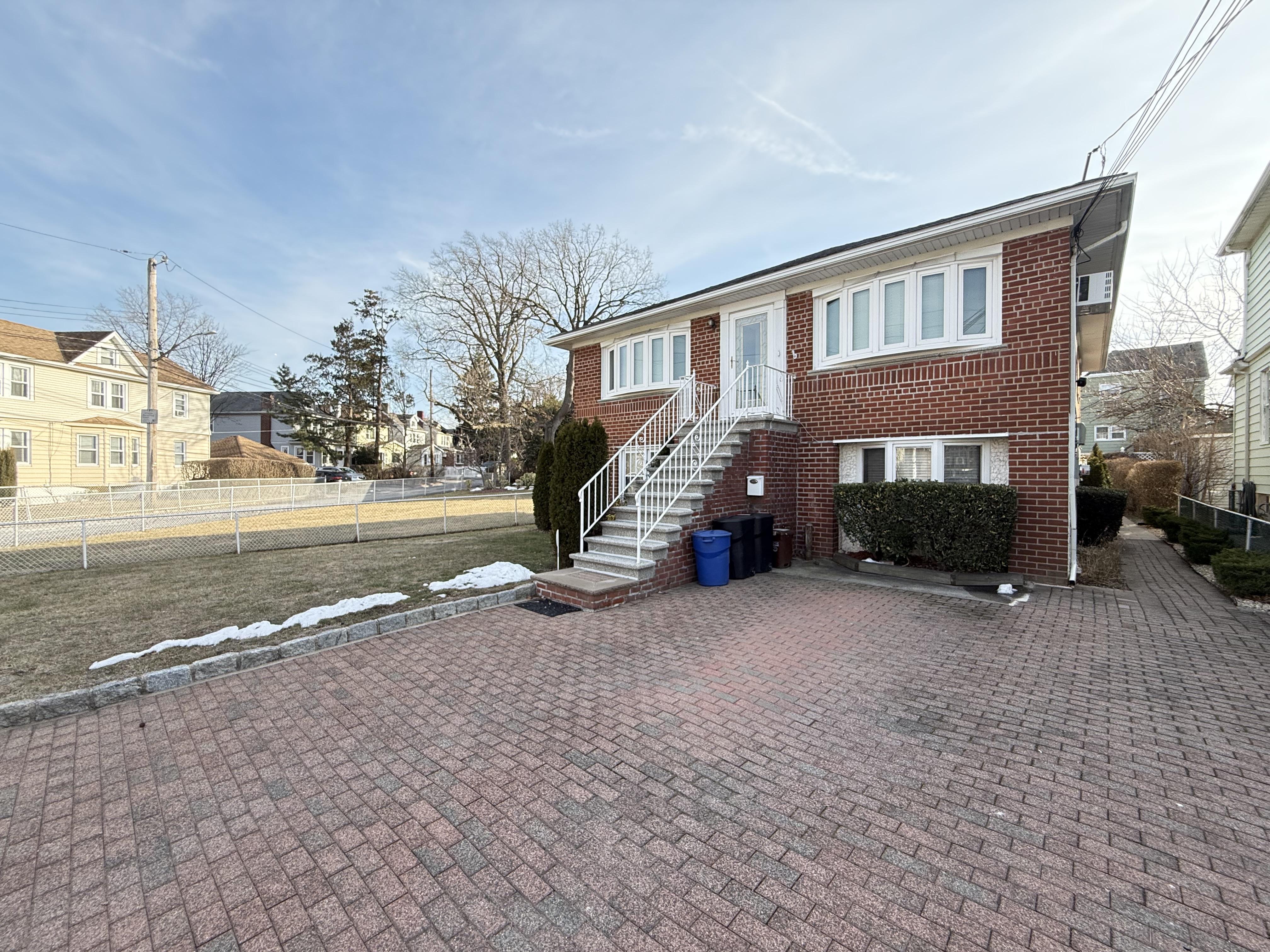 3236 Country Club Road Bronx, NY 10465 - Photo 2 of 22 a view of a house with a yard