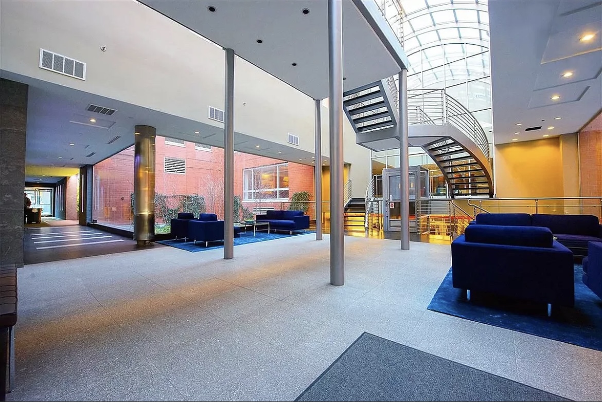 555 West 23rd Street, Unit S14E Manhattan, NY 10011 - Photo 5 of 8 a lobby with furniture and a rug