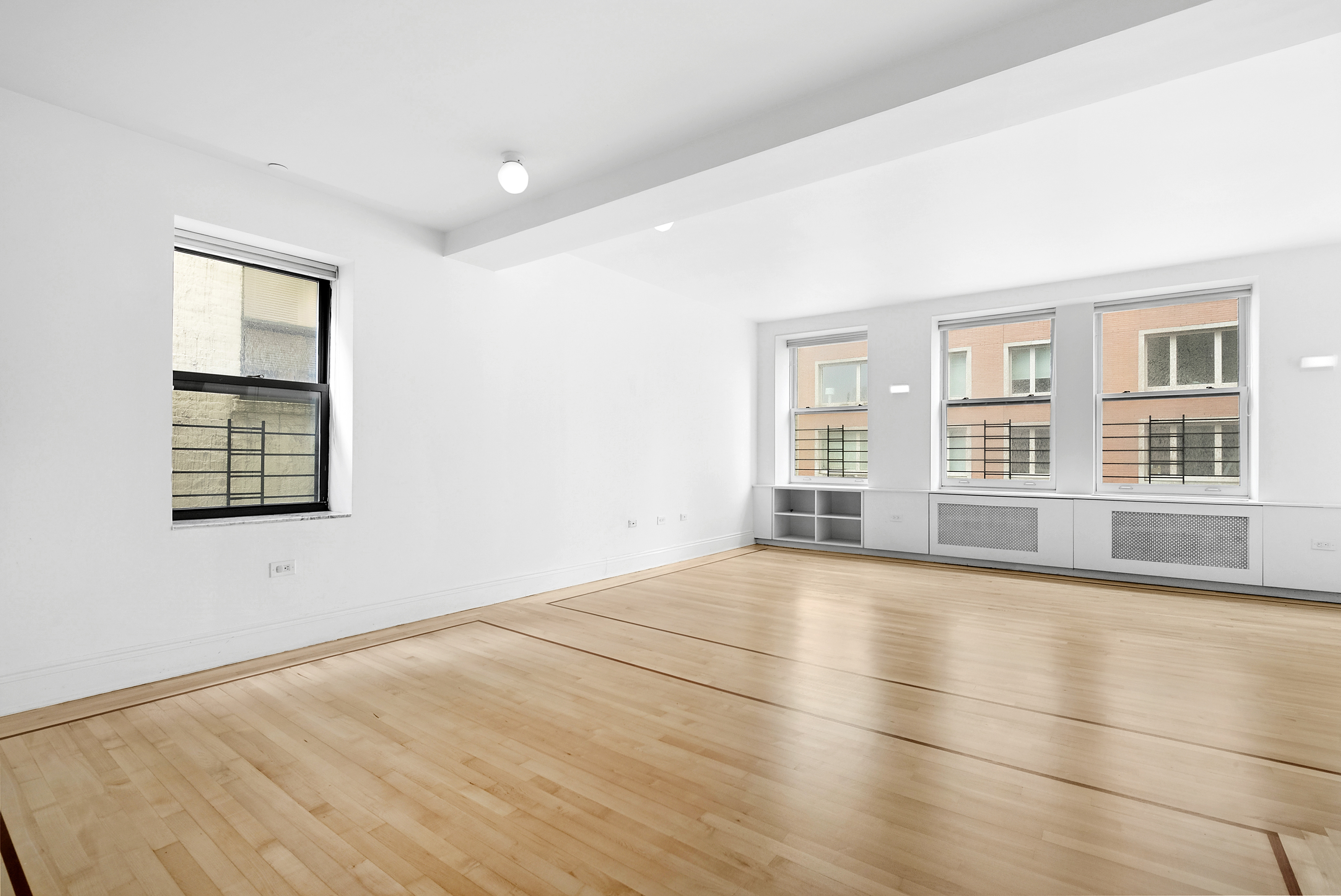 223 West 80th Street, Unit 7 Manhattan, NY 10024 - Photo 10 of 15 a view of an empty room with a window