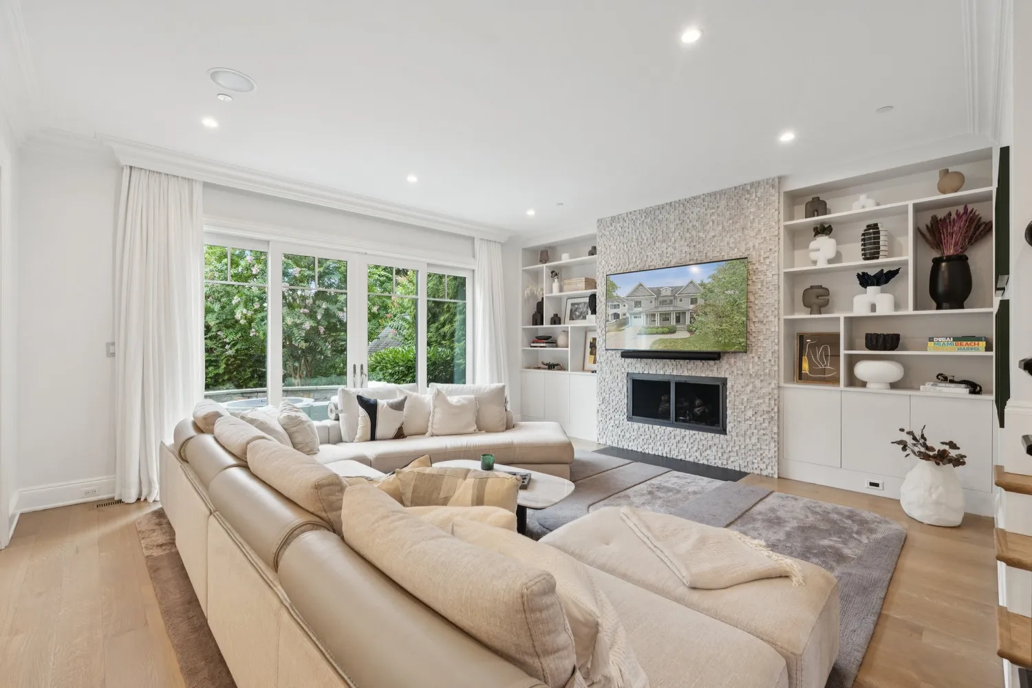 a living room with furniture and a fireplace