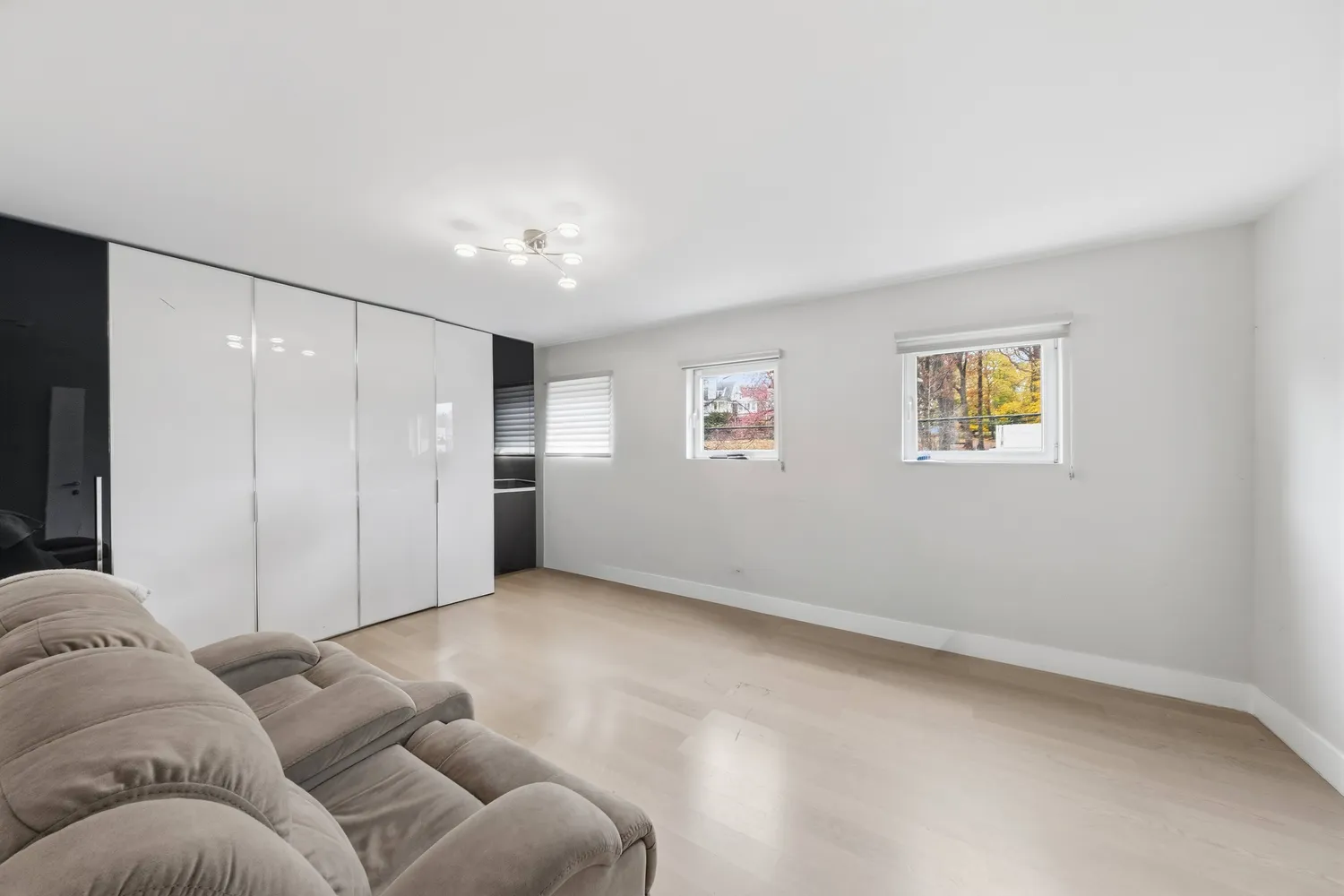 a living room with furniture and window