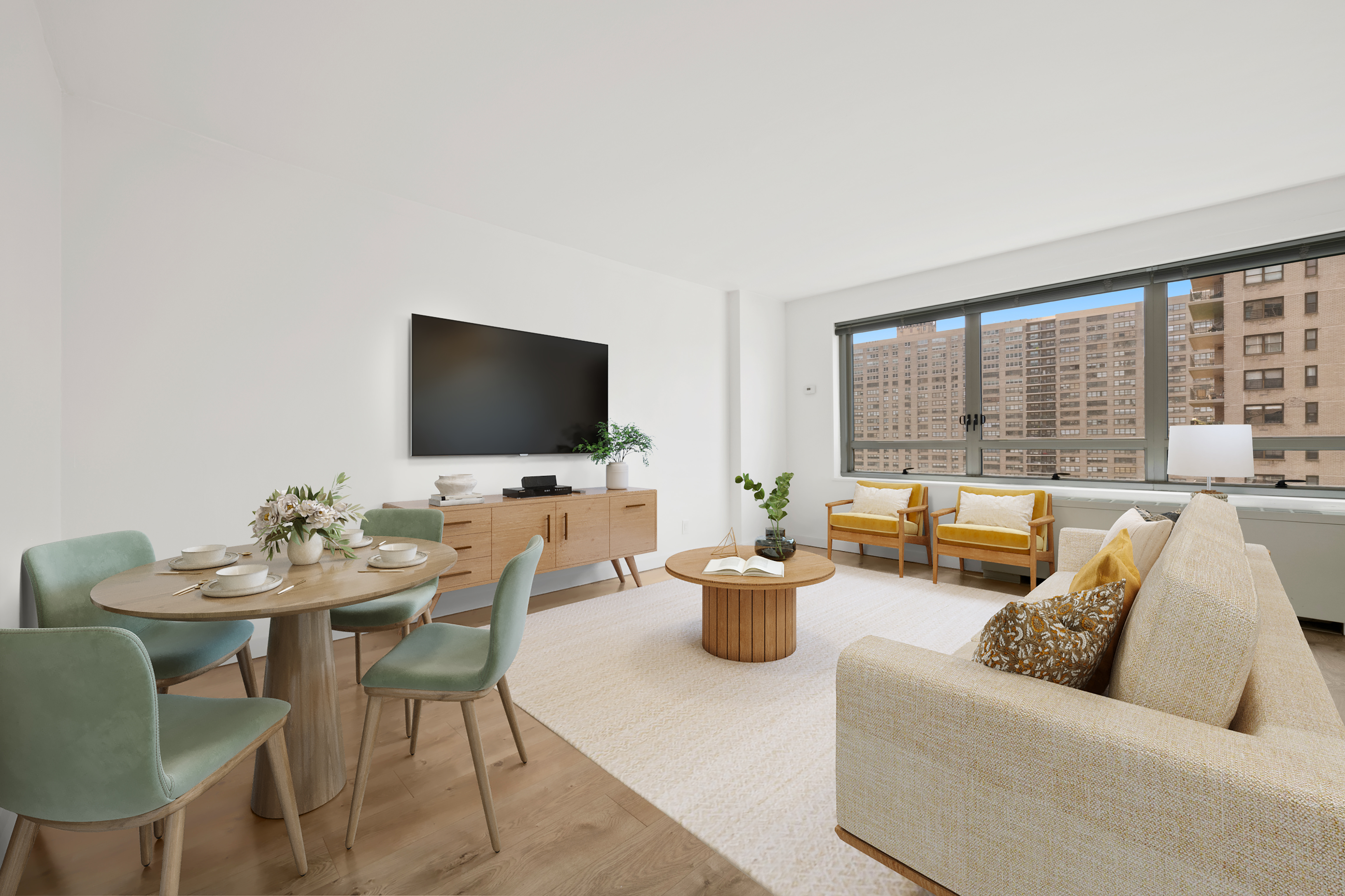 170 West End Avenue, Unit 15L Manhattan, NY 10023 - Photo 2 of 11 a living room with furniture and a flat screen tv