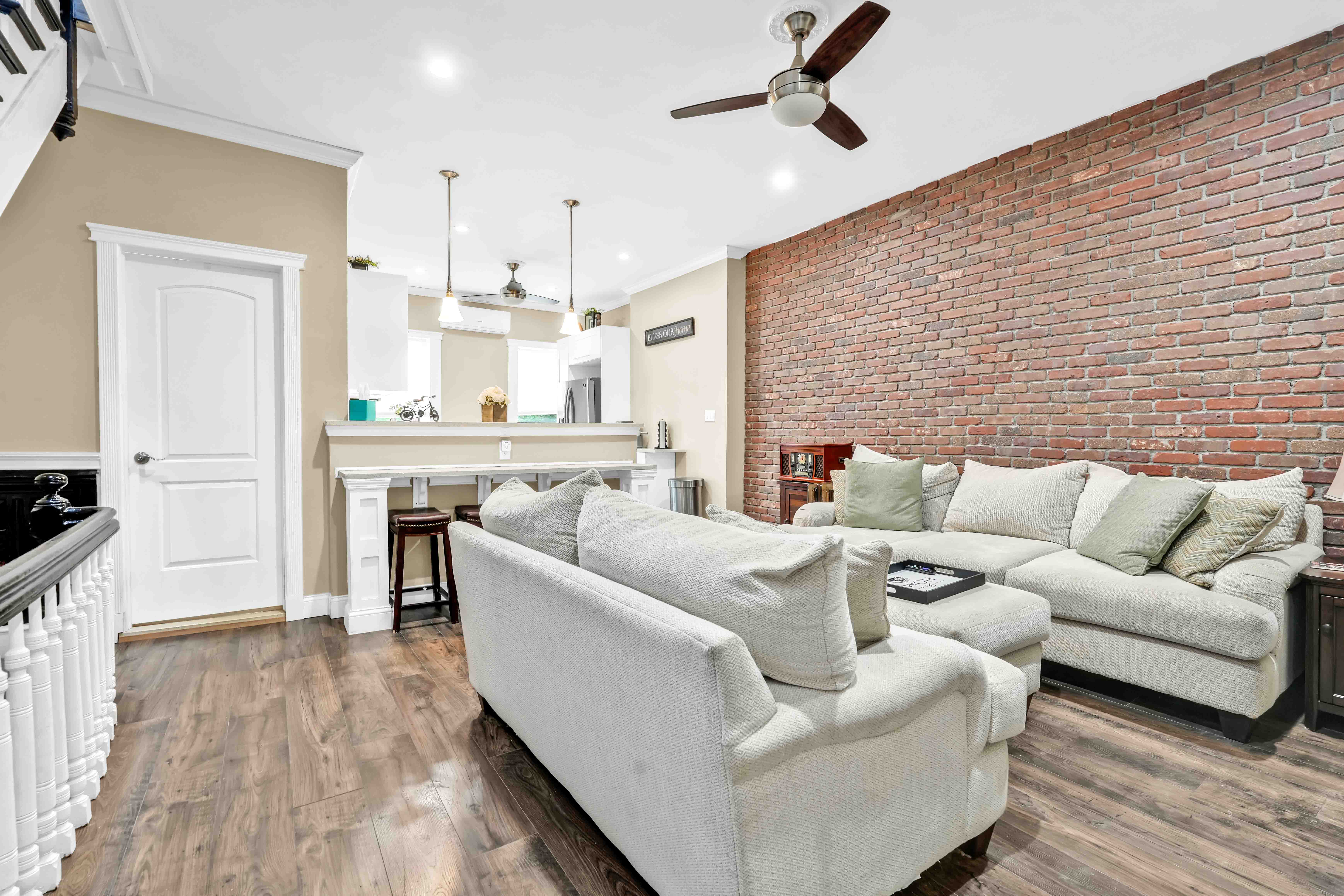 519 Monroe Street Brooklyn, NY 11221 - Photo 7 of 55 a living room with furniture and a fireplace