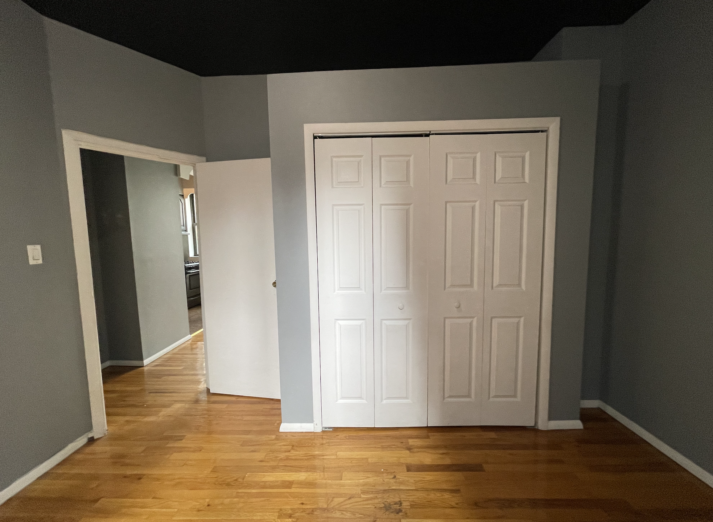 266 West 22nd Street, Unit 2 Manhattan, NY 10011 - Photo 9 of 14 a view of empty room with wooden floor