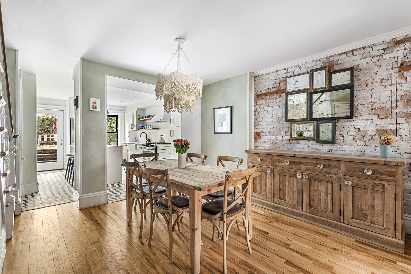 331 A Stuyvesant Avenue Brooklyn, NY 11233 - Photo 6 of 21 a view of a dining room with furniture a chandelier and wooden floor