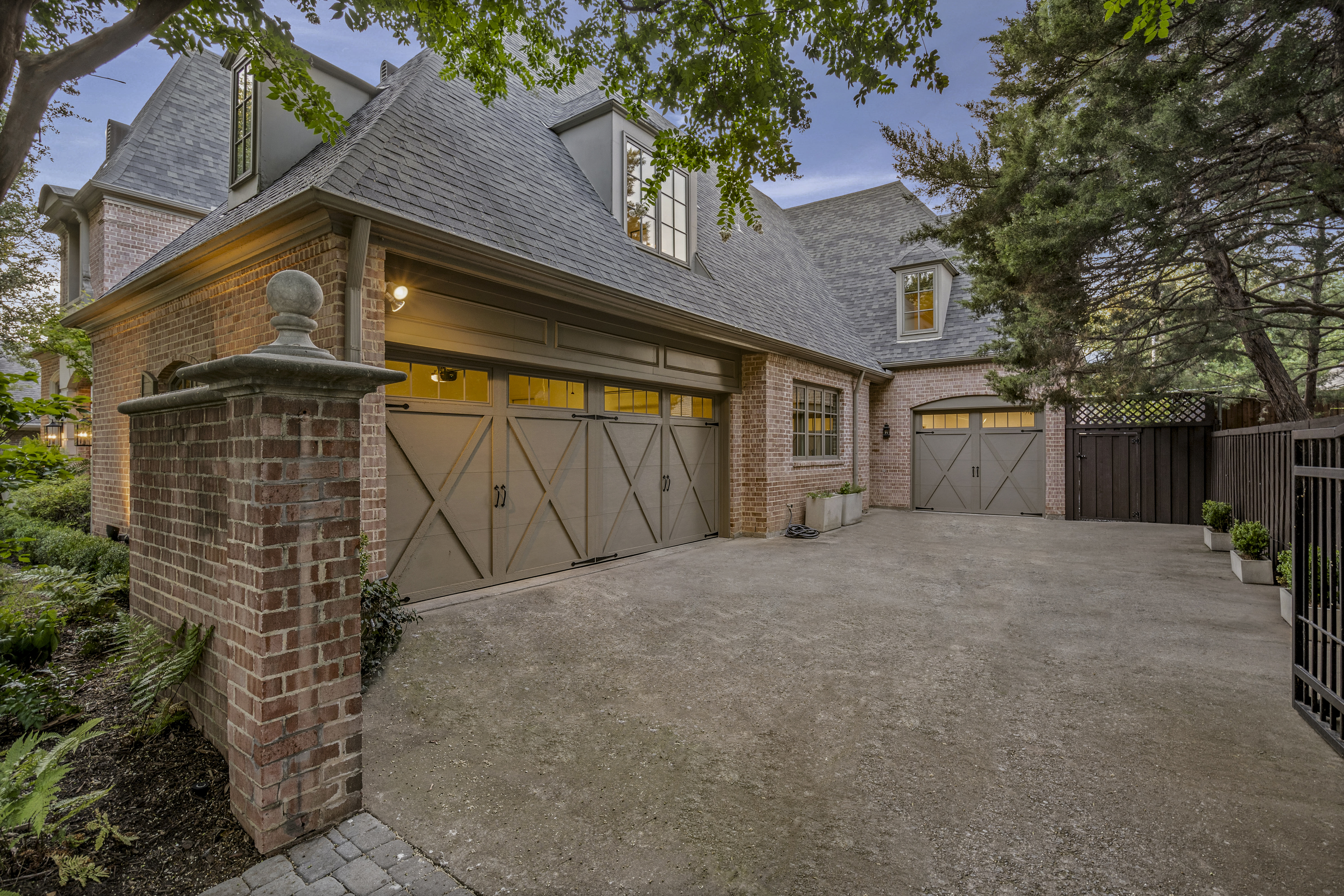 6607 Meadow Road Dallas, TX 75230 - Photo 32 of 32 a view of a house with a wooden fence