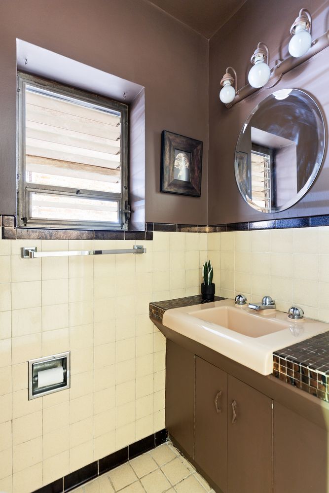 315 Washington Avenue Brooklyn, NY 11205 - Photo 11 of 38 a bathroom with a sink and a mirror