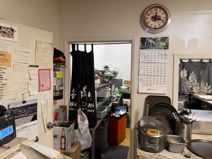 a view of a chairs and table in a room