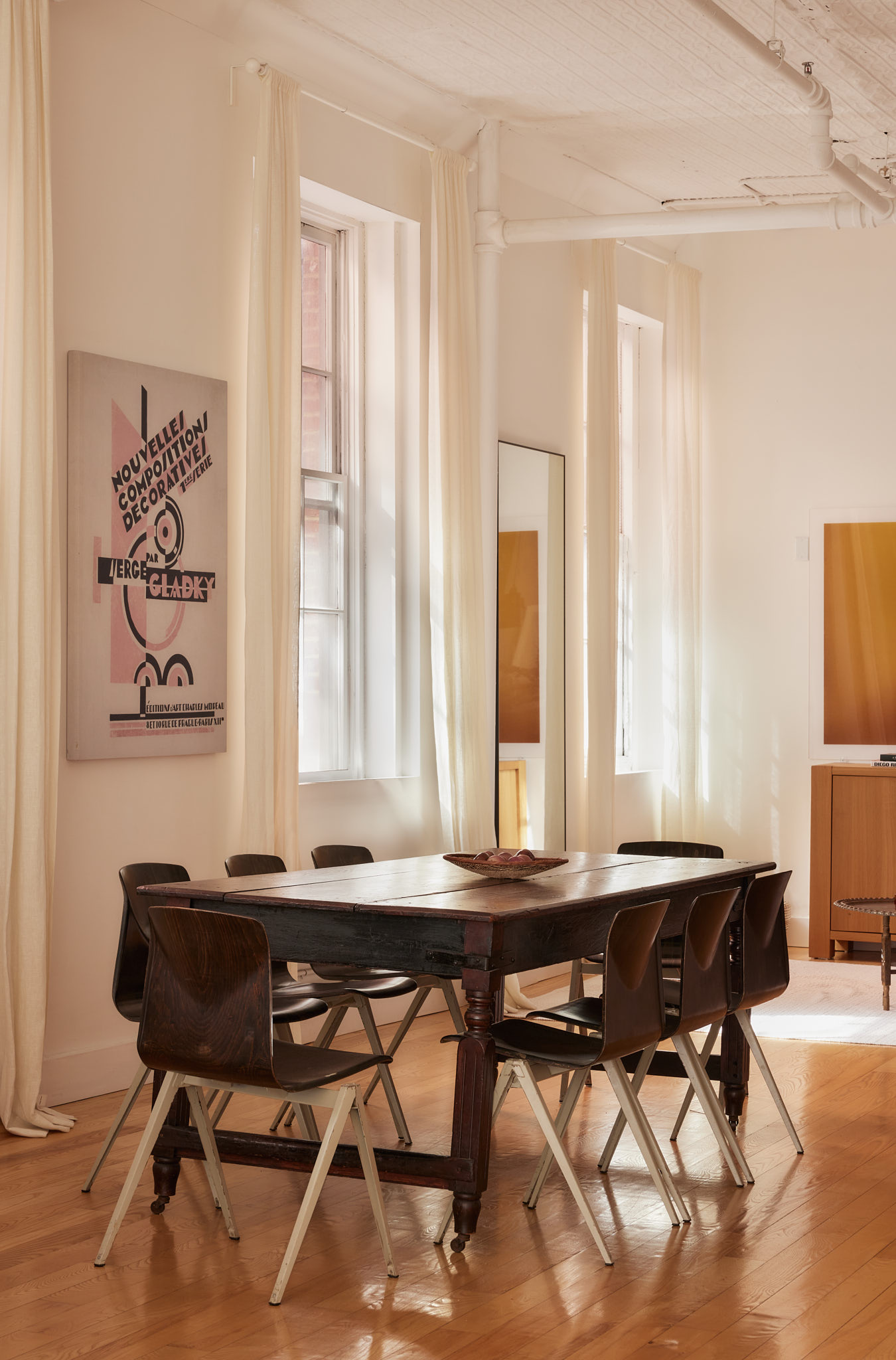 2 Bond Street, Unit 2 Manhattan, NY 10012 - Photo 6 of 16 a room with a table and chairs in it