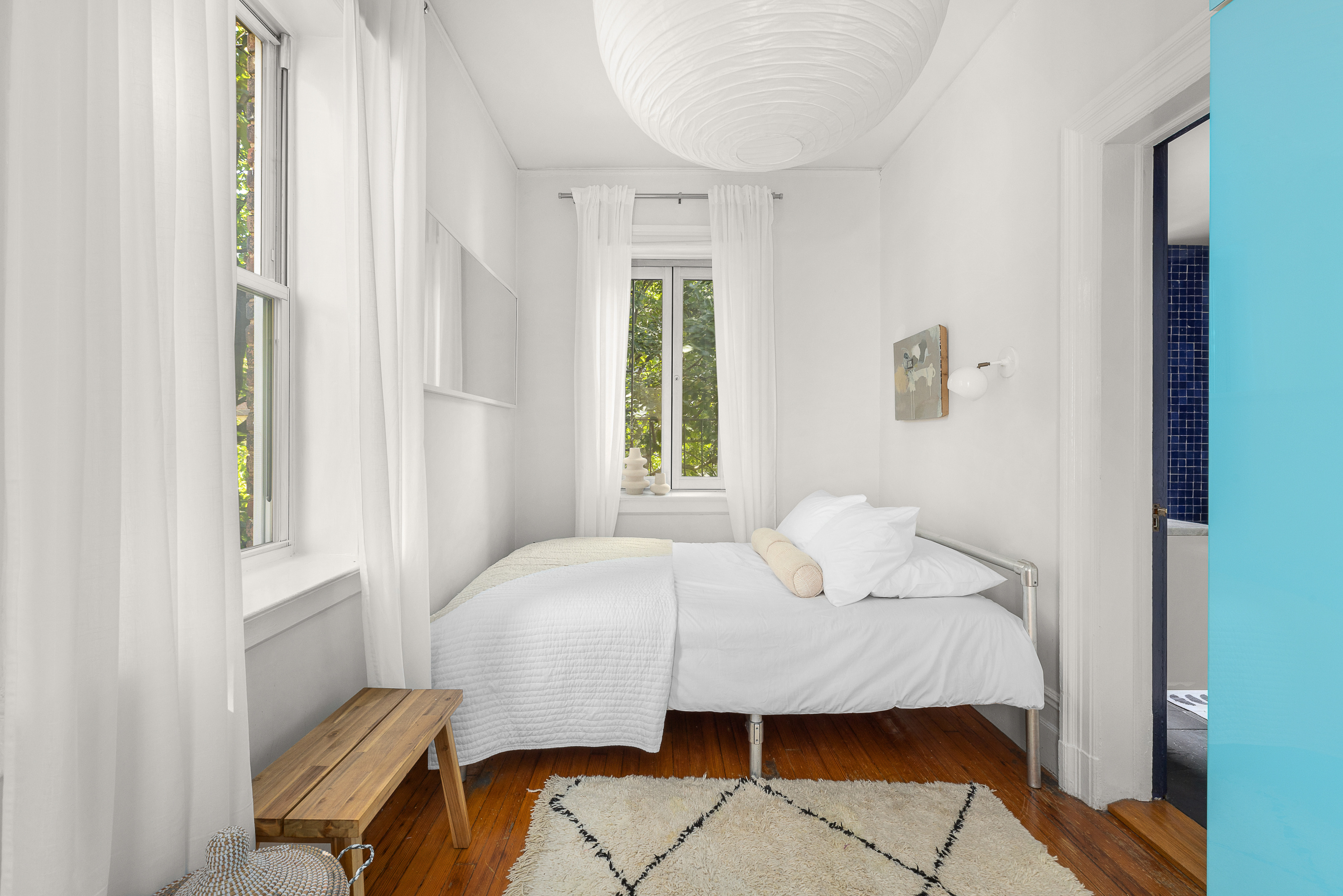 214 Carlton Avenue, Unit 2 Brooklyn, NY 11205 - Photo 7 of 16 a bedroom with a bed and window