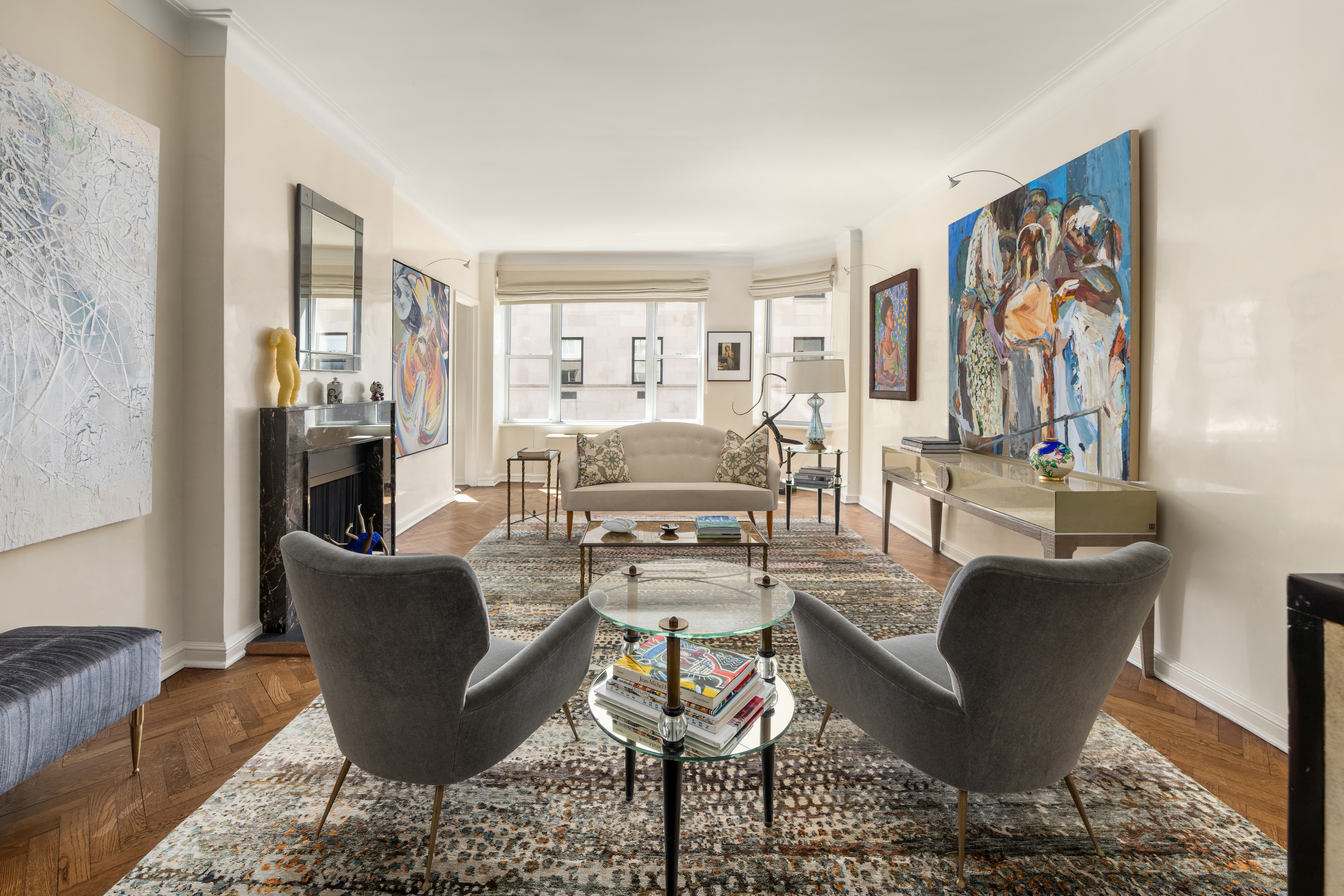 1 East 66th Street, Unit 9EF Manhattan, NY 10065 - Photo 3 of 19 a living room with furniture and wooden floor