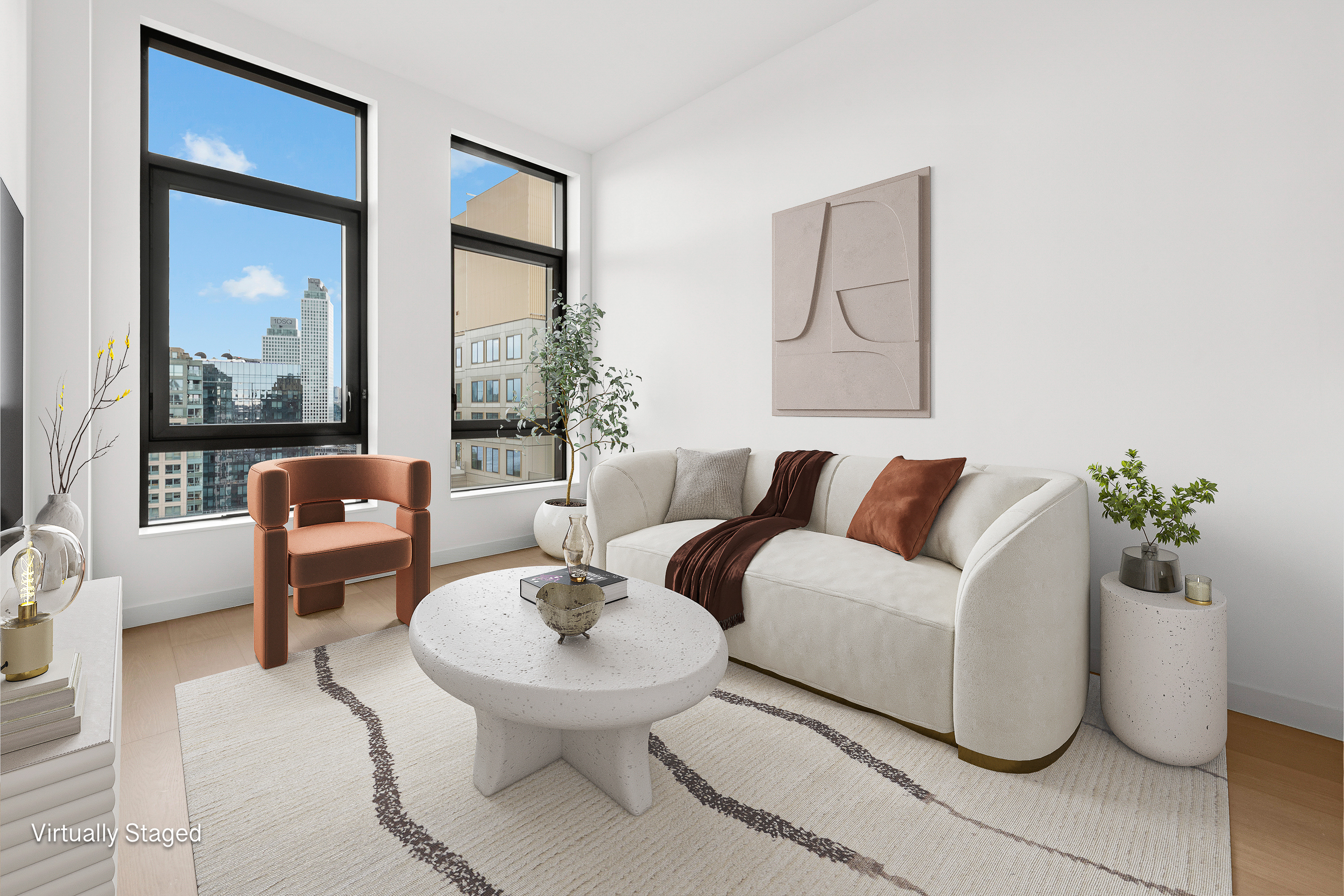 480 Kent Avenue, Unit 21C Brooklyn, NY 11249 - Photo 1 of 23 a living room with furniture and a potted plant
