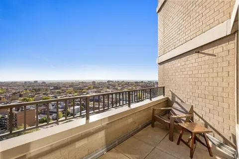a view of balcony with city view