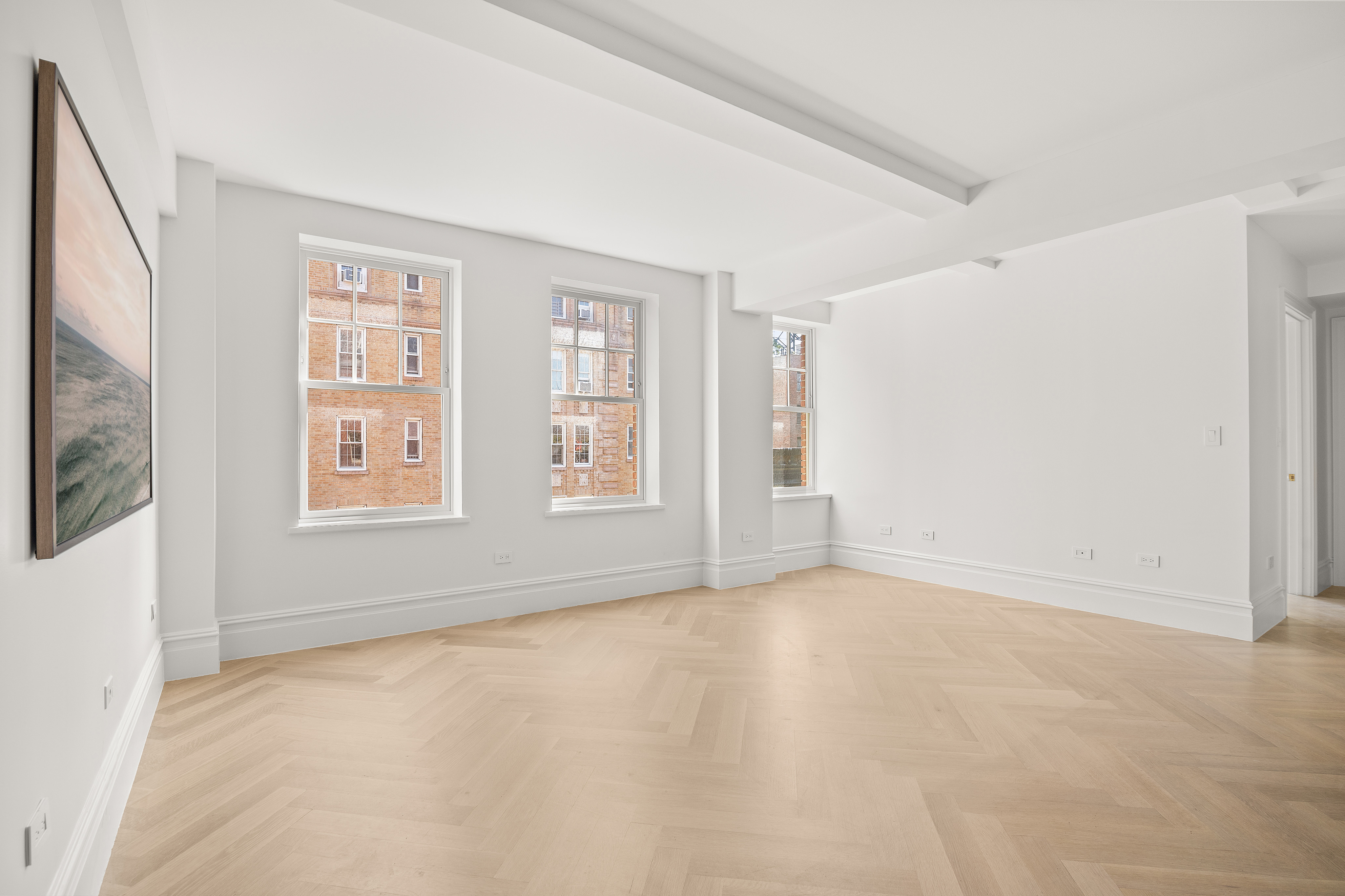 150 West 82nd Street, Unit 7A Manhattan, NY 10024 - Photo 2 of 15 an empty room with windows