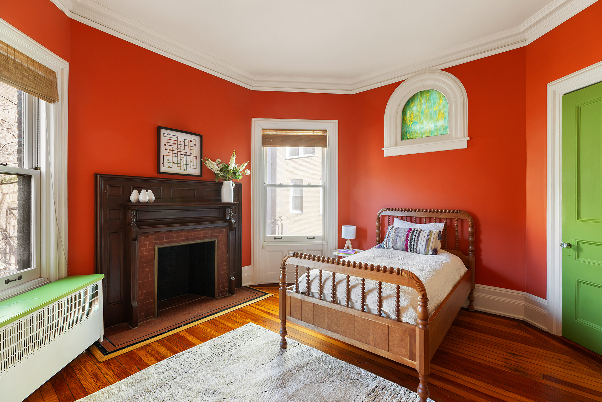 323 Garfield Place Brooklyn, NY 11215 - Photo 9 of 14 a bedroom with a bed and a fireplace