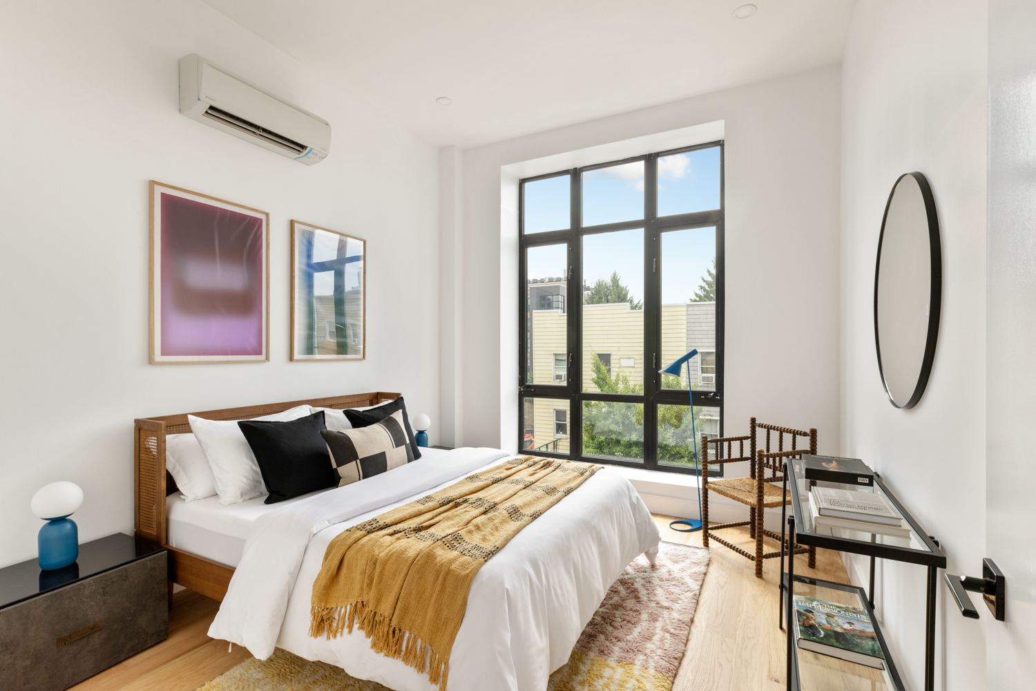 185 Withers Street, Unit 2 Brooklyn, NY 11211 - Photo 6 of 13 a bedroom with bed and a large window