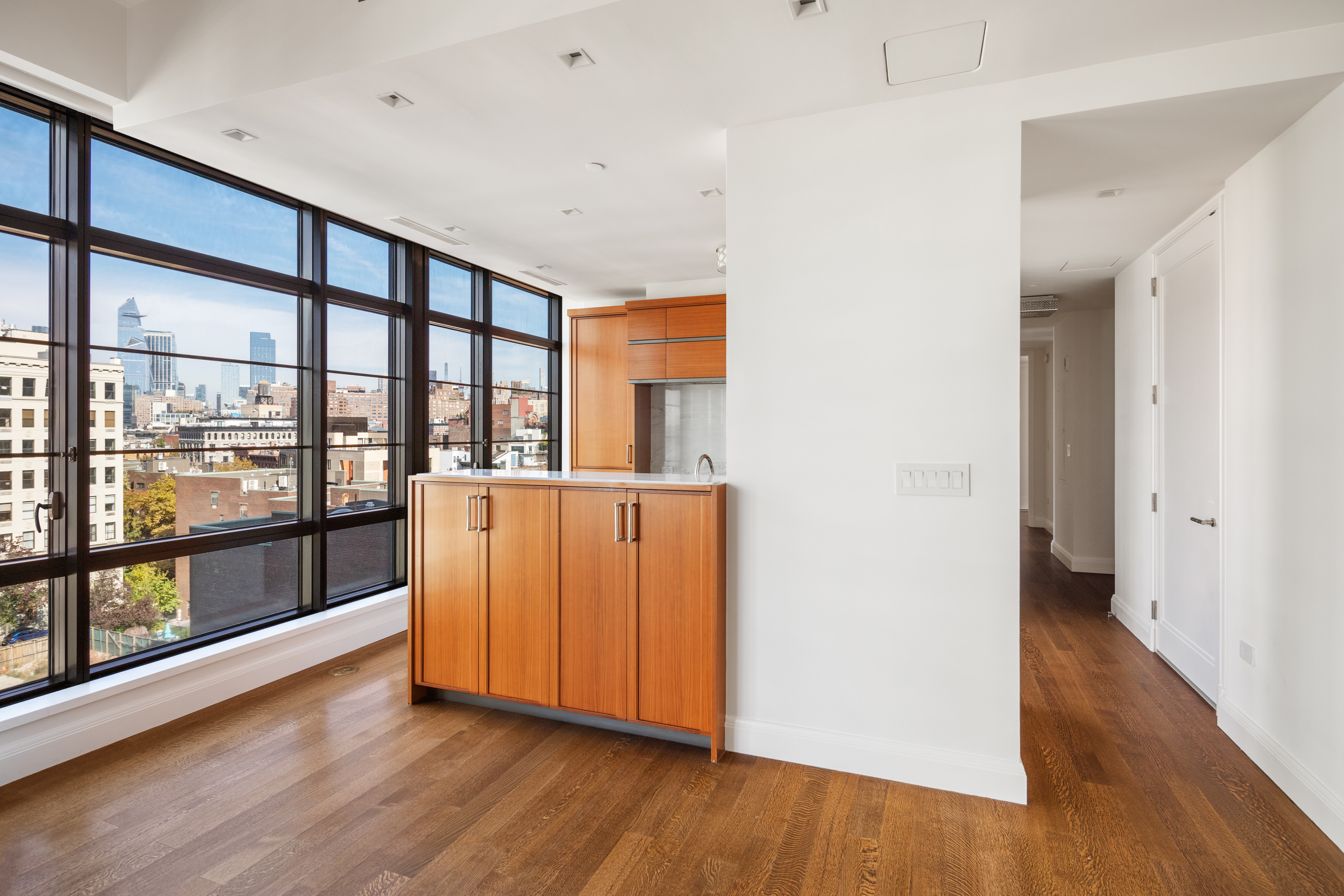 150 Charles Street, Unit 7CN Manhattan, NY 10014 - Photo 3 of 13 a view of kitchen with furniture and wooden floor
