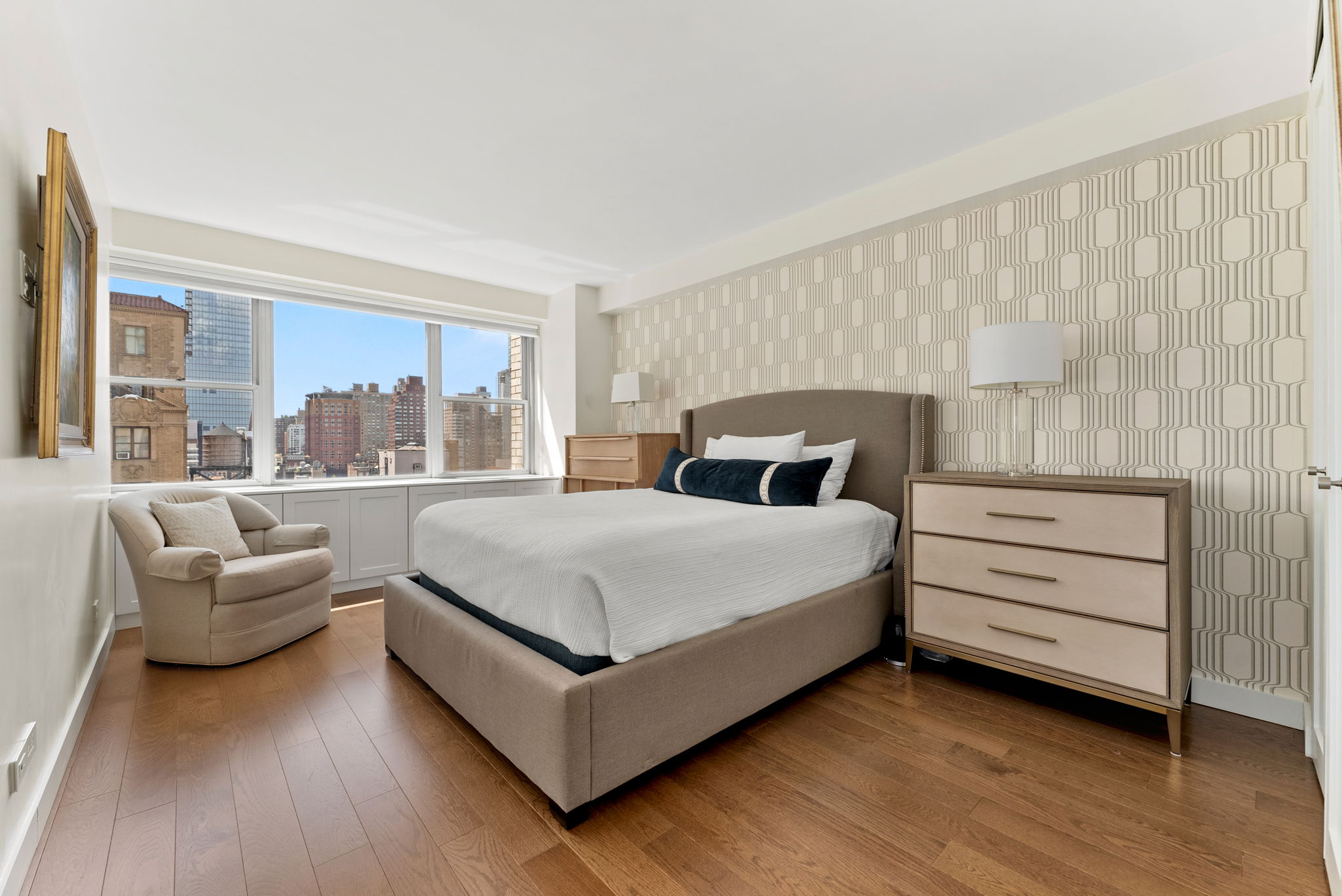 15 West 72nd Street, Unit 22O Manhattan, NY 10023 - Photo 6 of 8 a bedroom with a bed and a large window