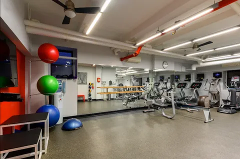 a view of a room with gym equipment