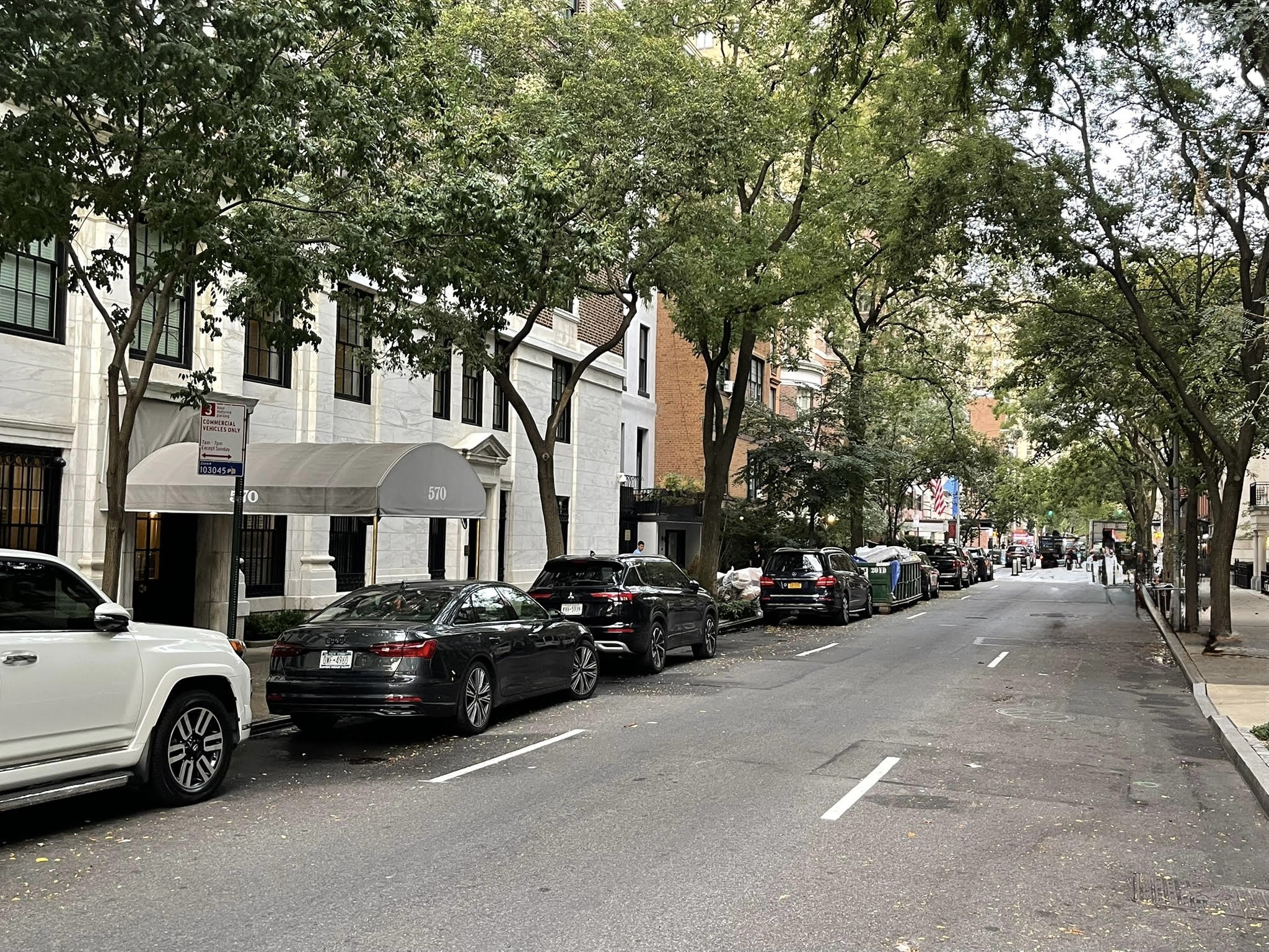 570 Park Avenue, Unit 4A Manhattan, NY 10065 - Photo 19 of 20 a view of a cars park in front of a house