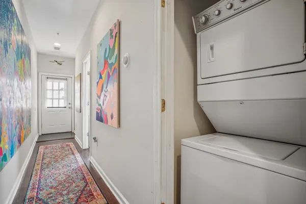 a view of hallway with washer and dryer