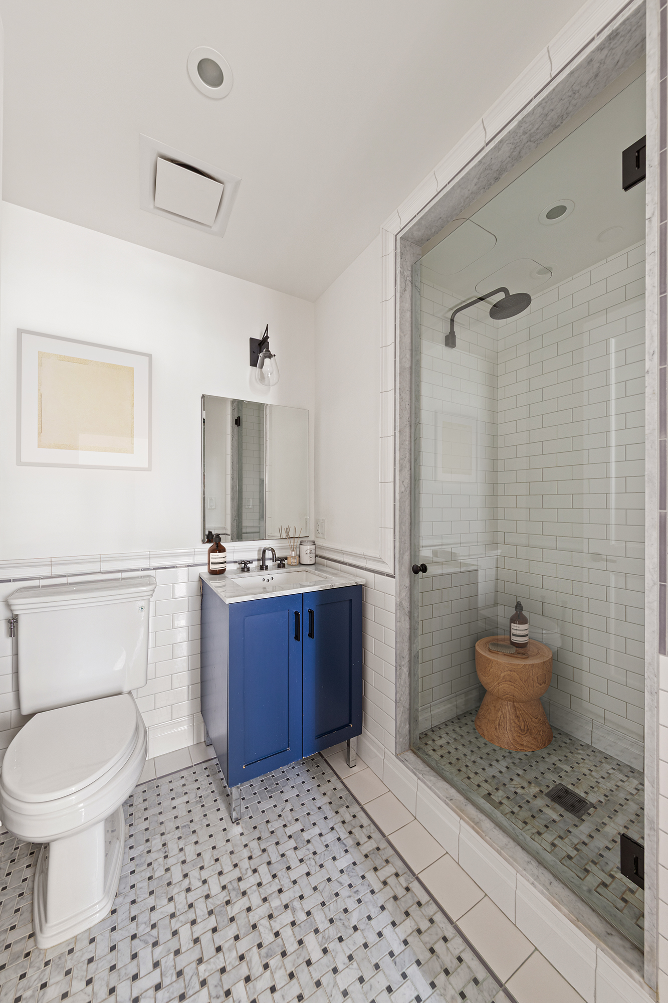 265 State Street, Unit PH02 Brooklyn, NY 11201 - Photo 17 of 31 a bathroom with a toilet a sink and mirror