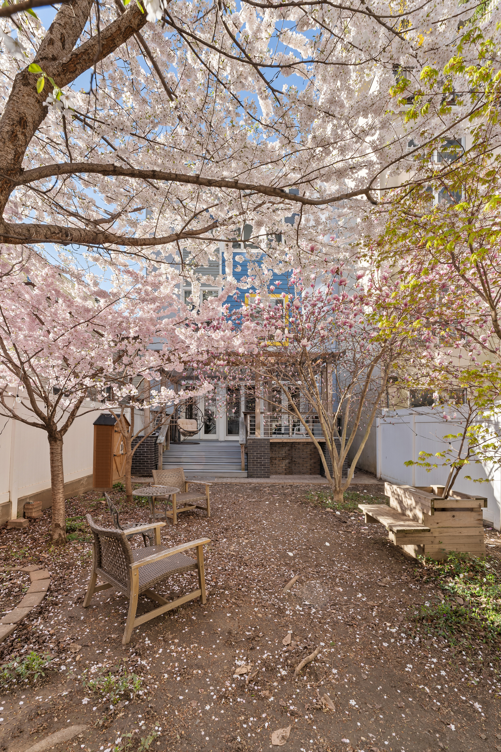 65 Jackson Street Brooklyn, NY 11211 - Photo 12 of 36 a bench is sitting in middle of the forest