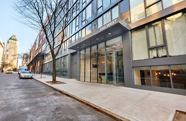 540 West 49th Street, Unit 206N Manhattan, NY 10019 - Photo 13 of 14 a view of a building with a street