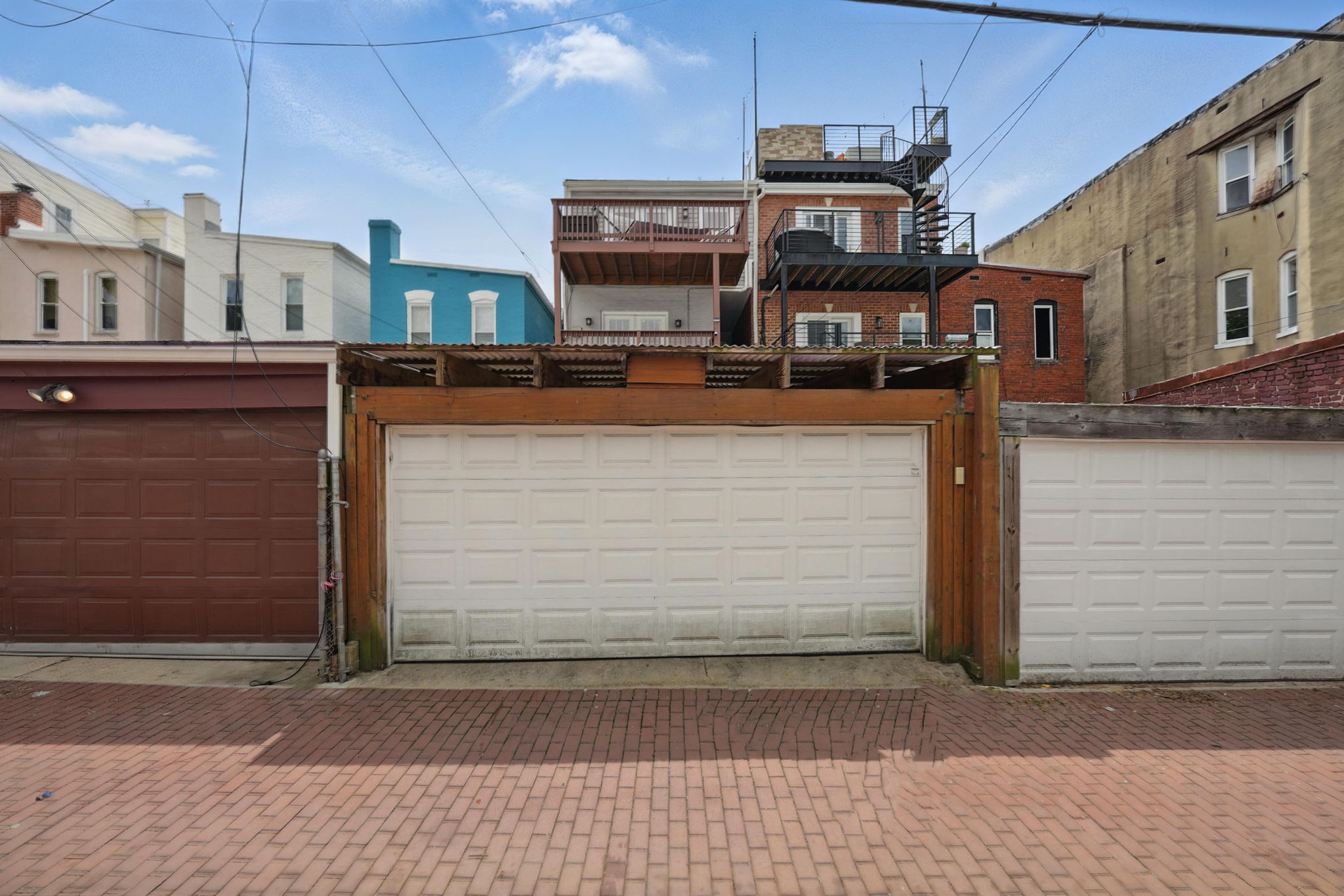 28 Q Street Northeast, Unit 2 Washington, DC 20002 - Photo 40 of 41 a view of a building with car parked